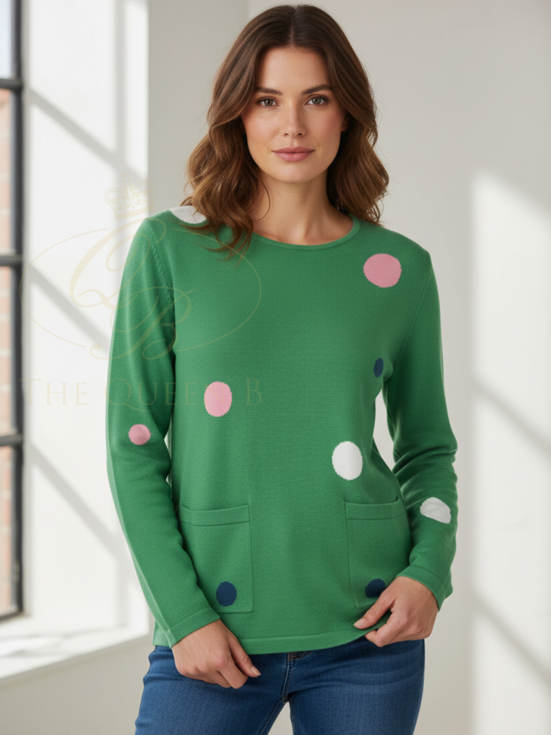 Alice Collins 036S560 Nicola Pullover with polka dot design and front patch pockets in soft knit fabric.