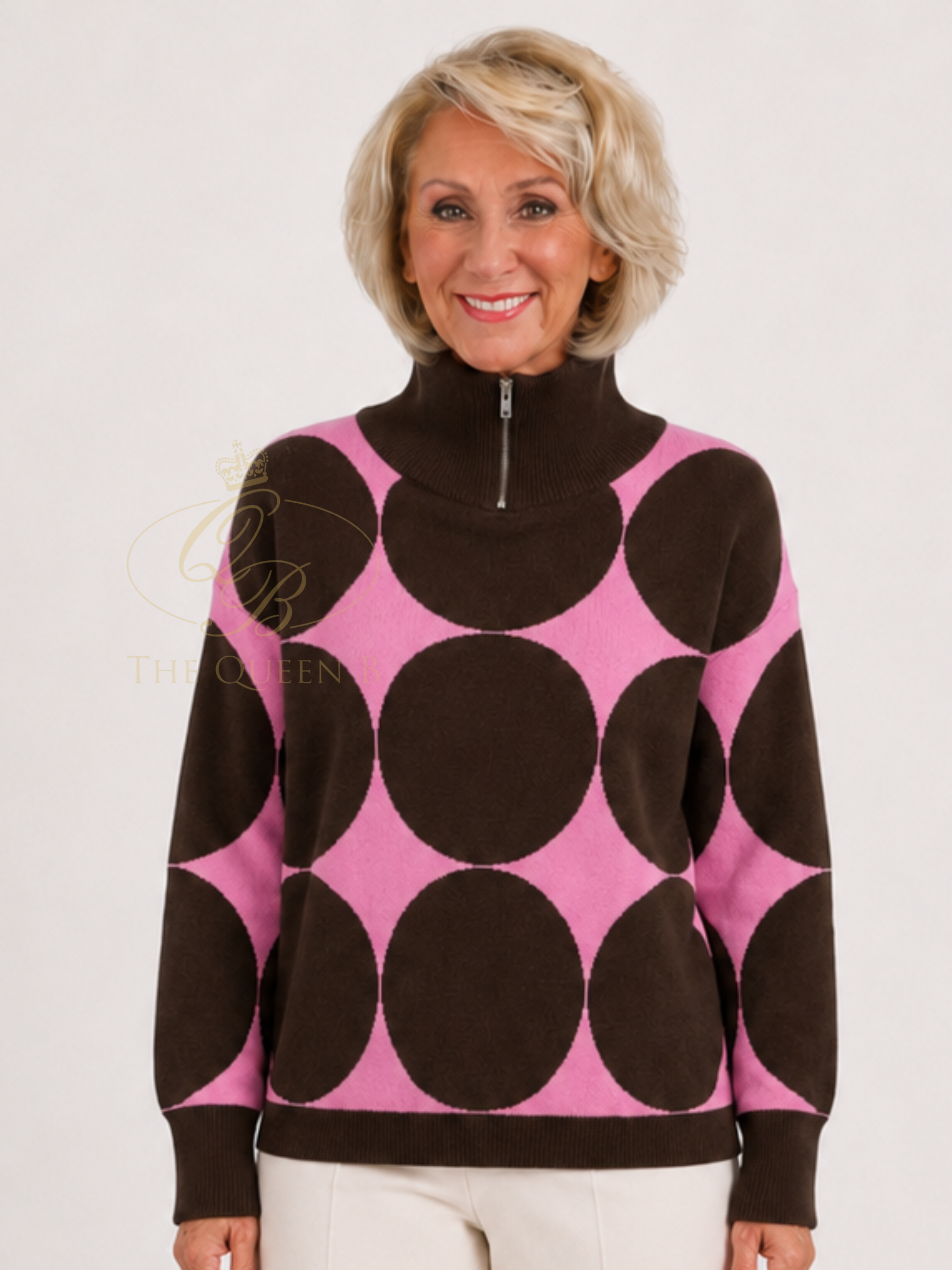 Alice Collins 037A099 Cecilia Pullover with zip neckline, long sleeves and bold circular pattern