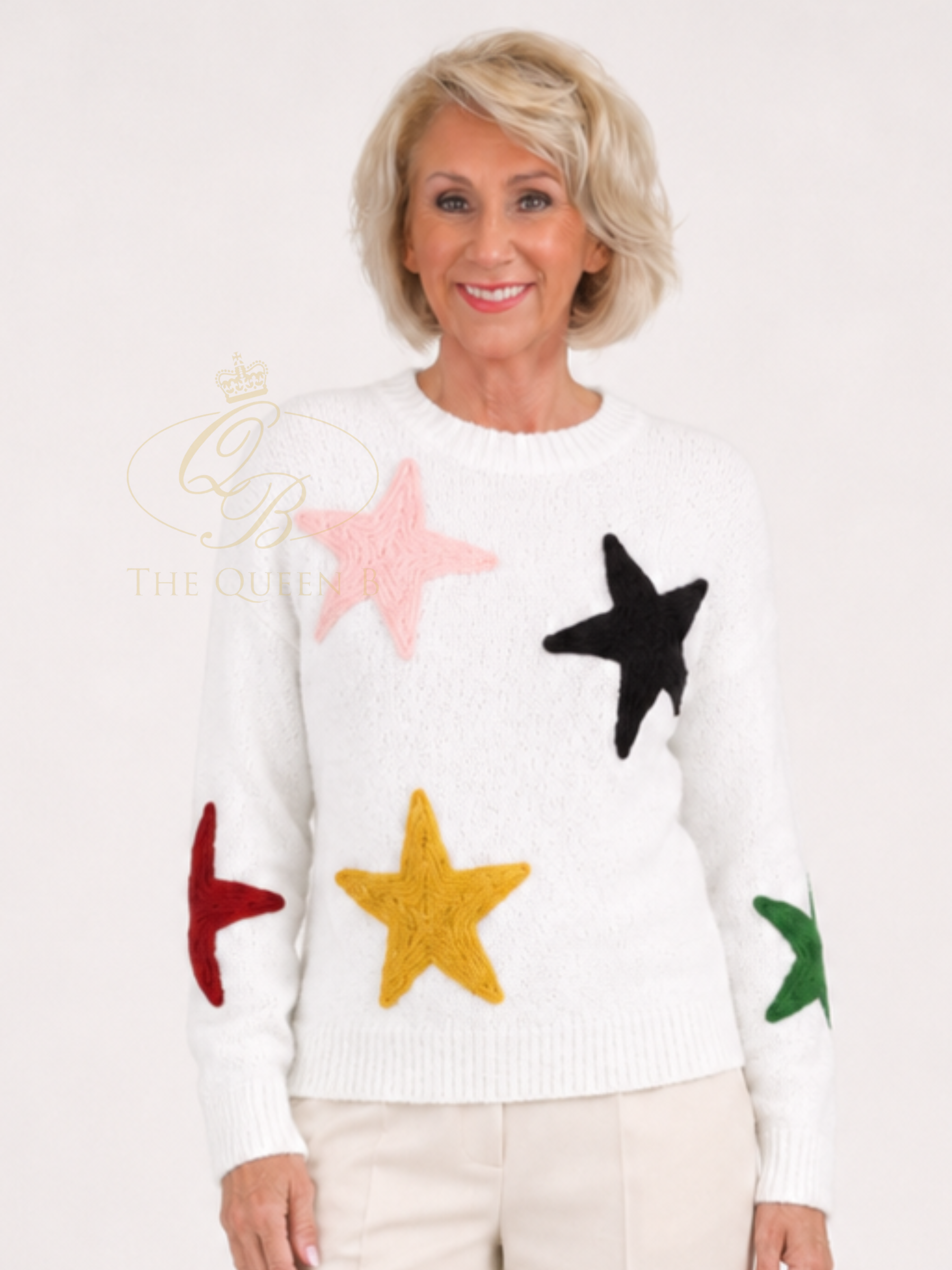 Alice Collins 037A314 Cleo Pullover with round neckline, long sleeves and textured star appliqué detail