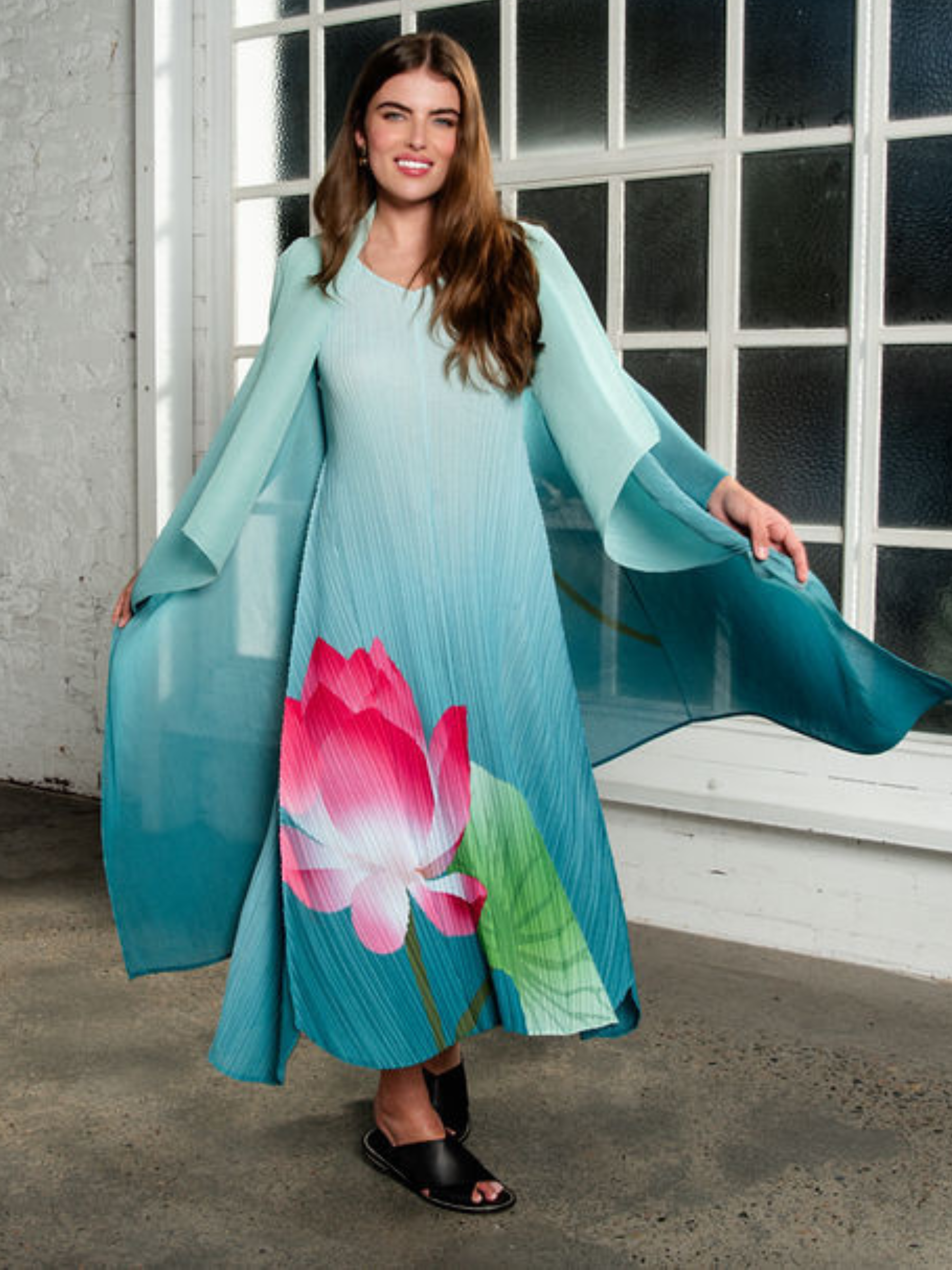 Alquema Lotus Dress & Coat turquoise hand-pleated dress and coat set with lotus floral print and flowing drape sleeves.