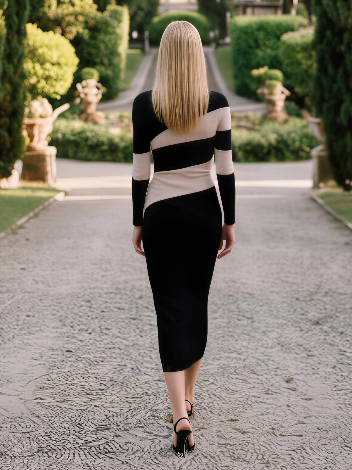 Arggido 21063 Bicolour Dress with contrast panel detailing, round neckline, long sleeves and fitted midi silhouette.