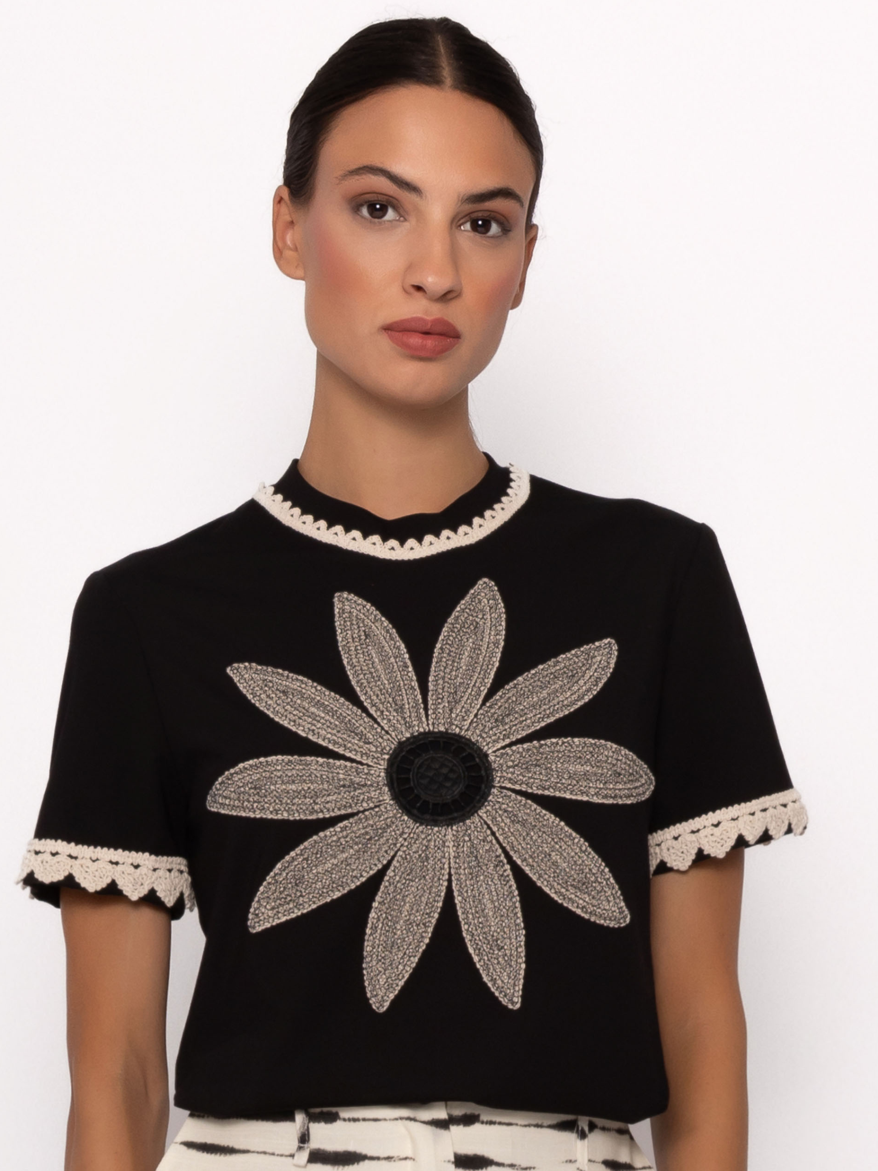 Arggido 49575 T-Shirt with statement floral motif, contrast trim neckline and short sleeves.