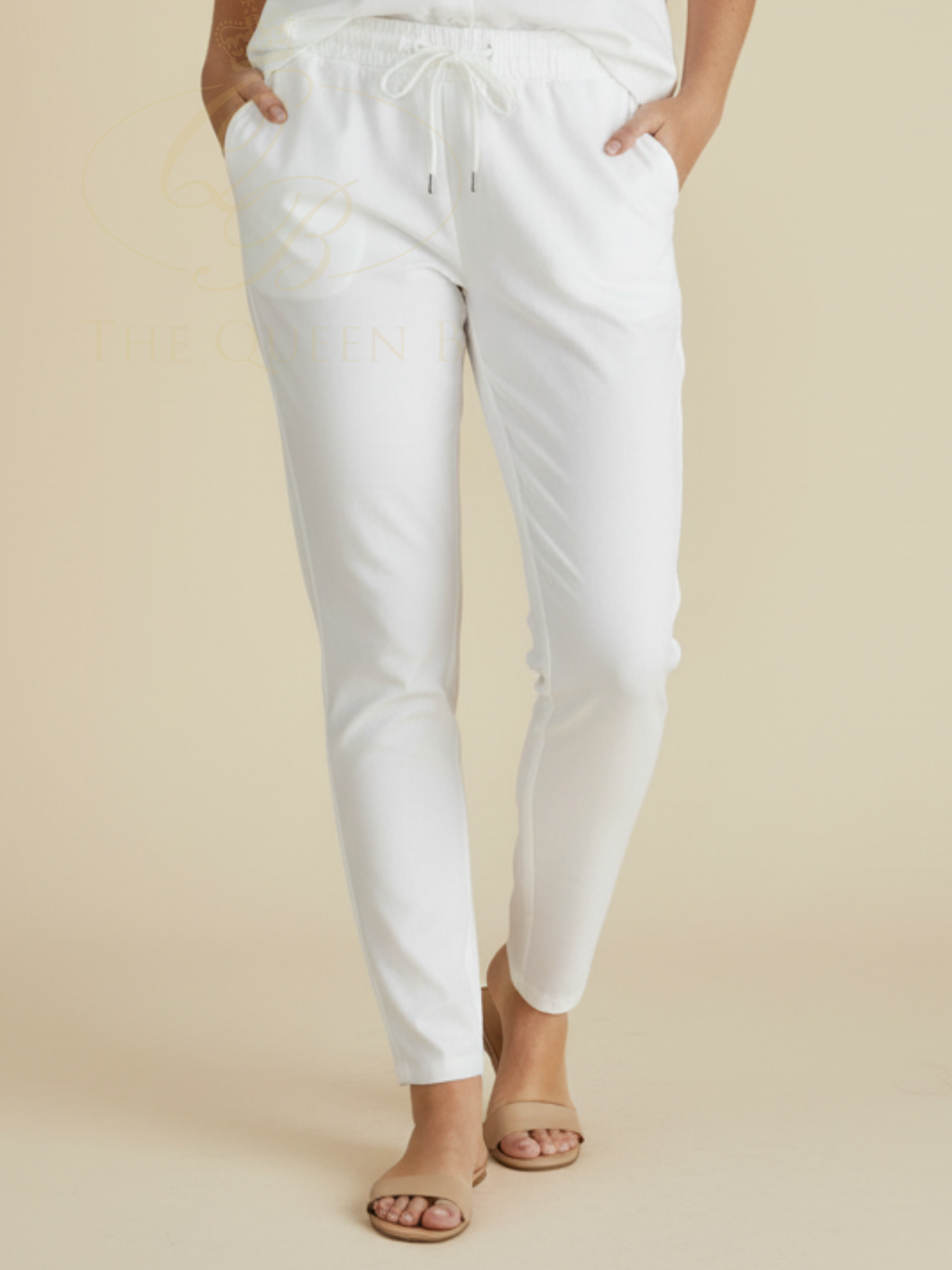 Betty Brooks Jeans with elasticated drawstring waistband, slim silhouette and side pockets.