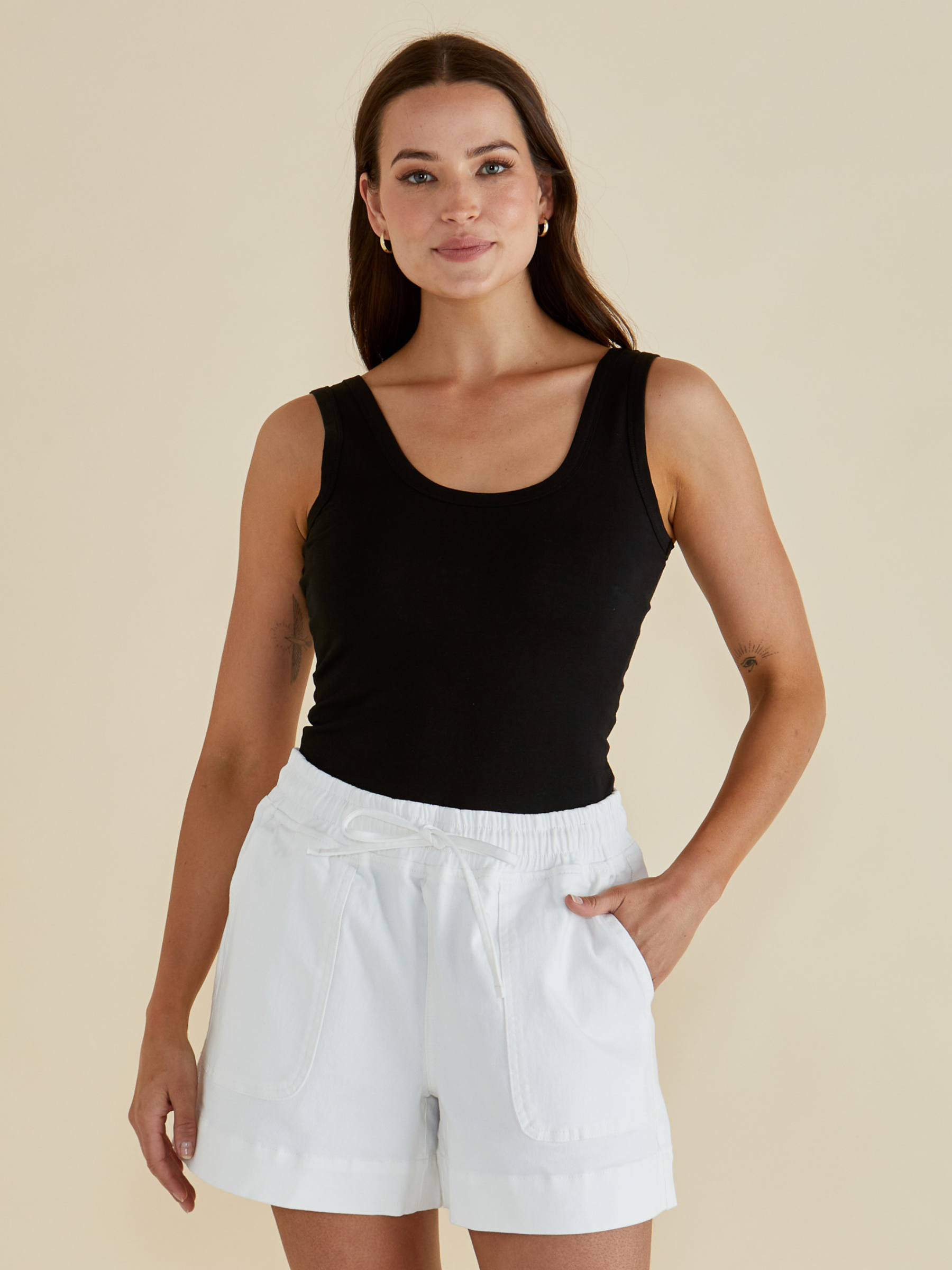 Betty Emma Scoop Tank with scoop neckline, sleeveless fitted silhouette and smooth streamlined design.