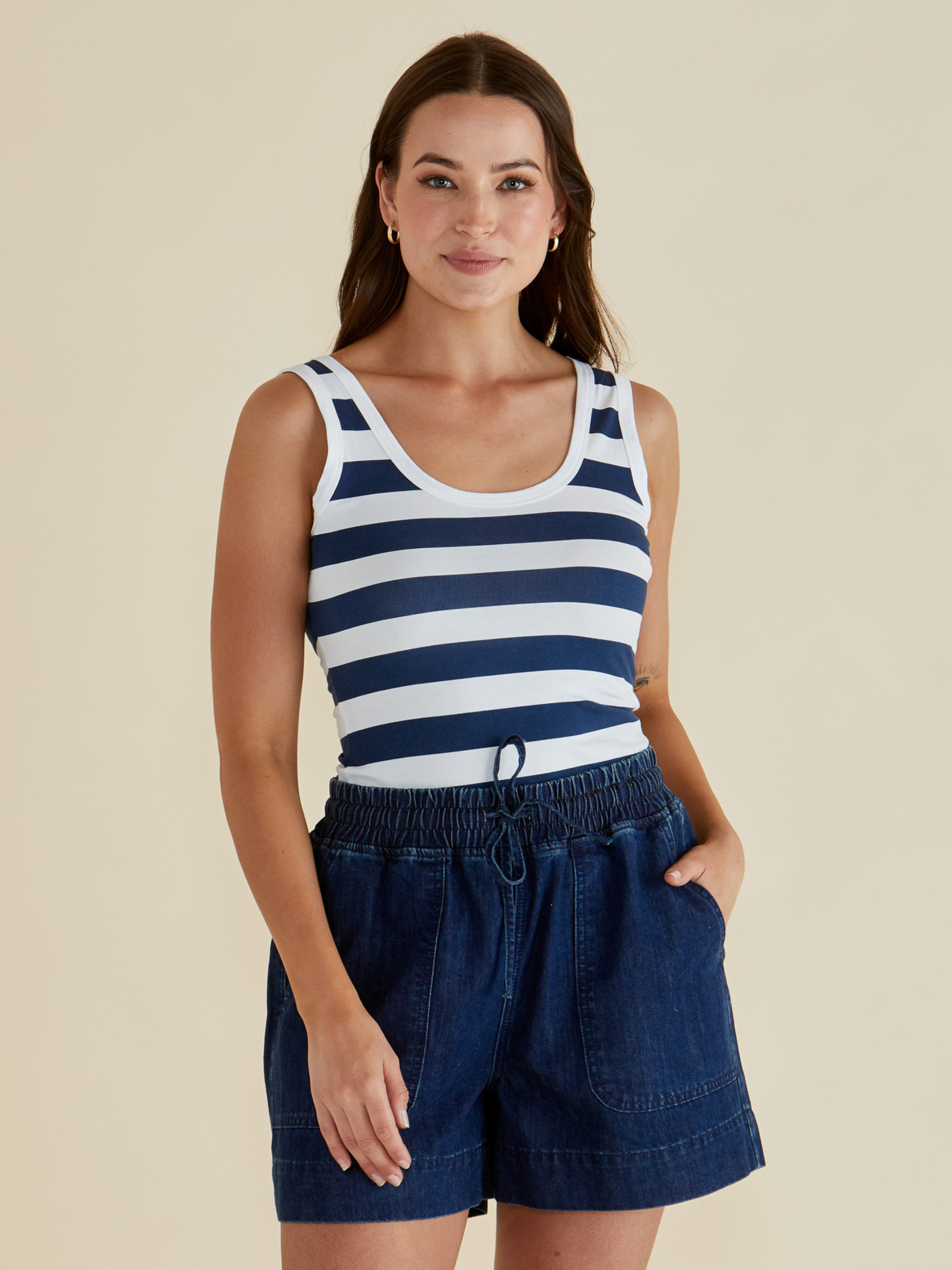 Betty Emma Scoop Tank with scoop neckline, sleeveless fitted silhouette and smooth streamlined design.