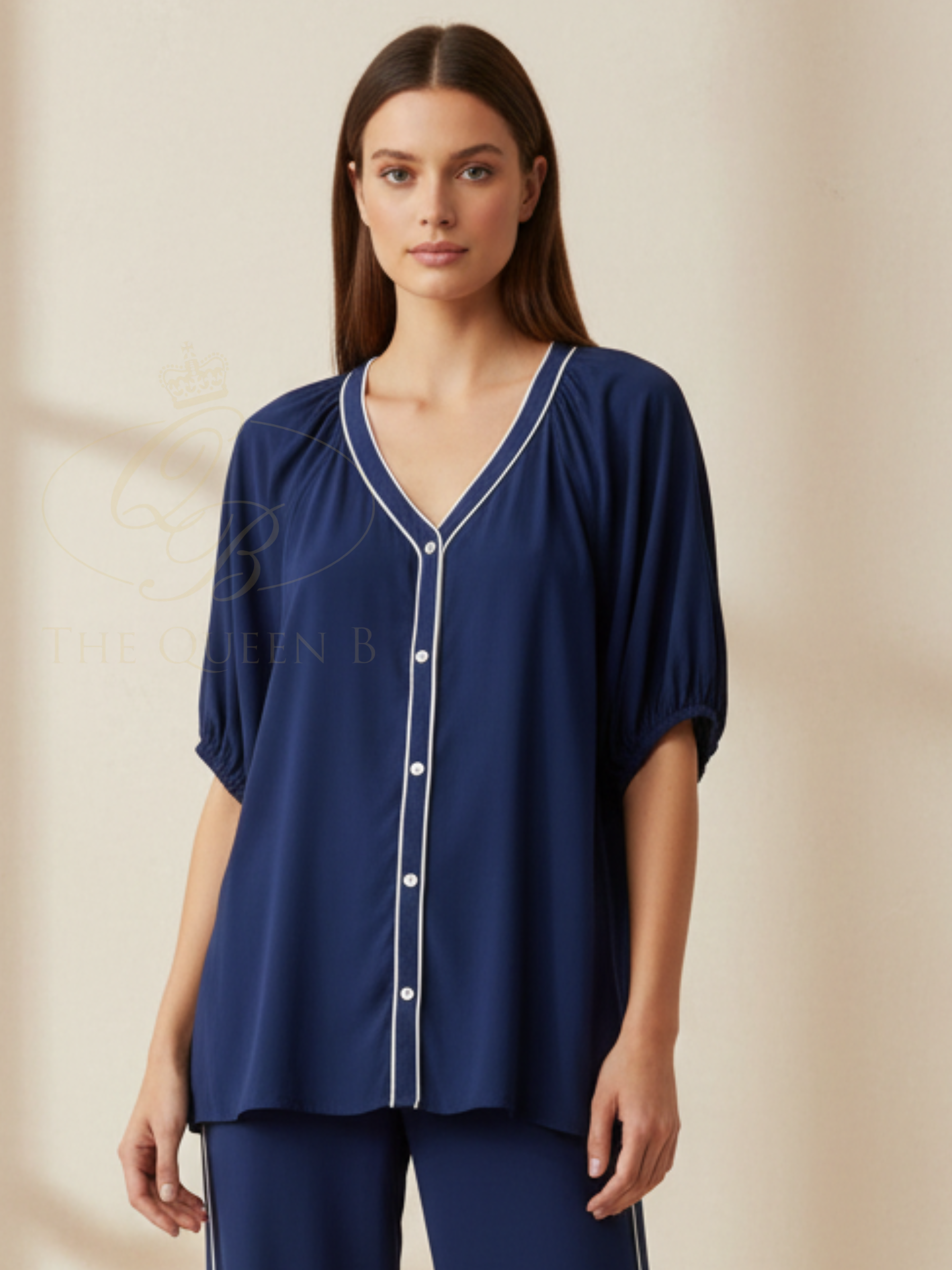 Betty Rio Reef Shirt with V neckline, contrast trim detail, button-through front and short sleeves.