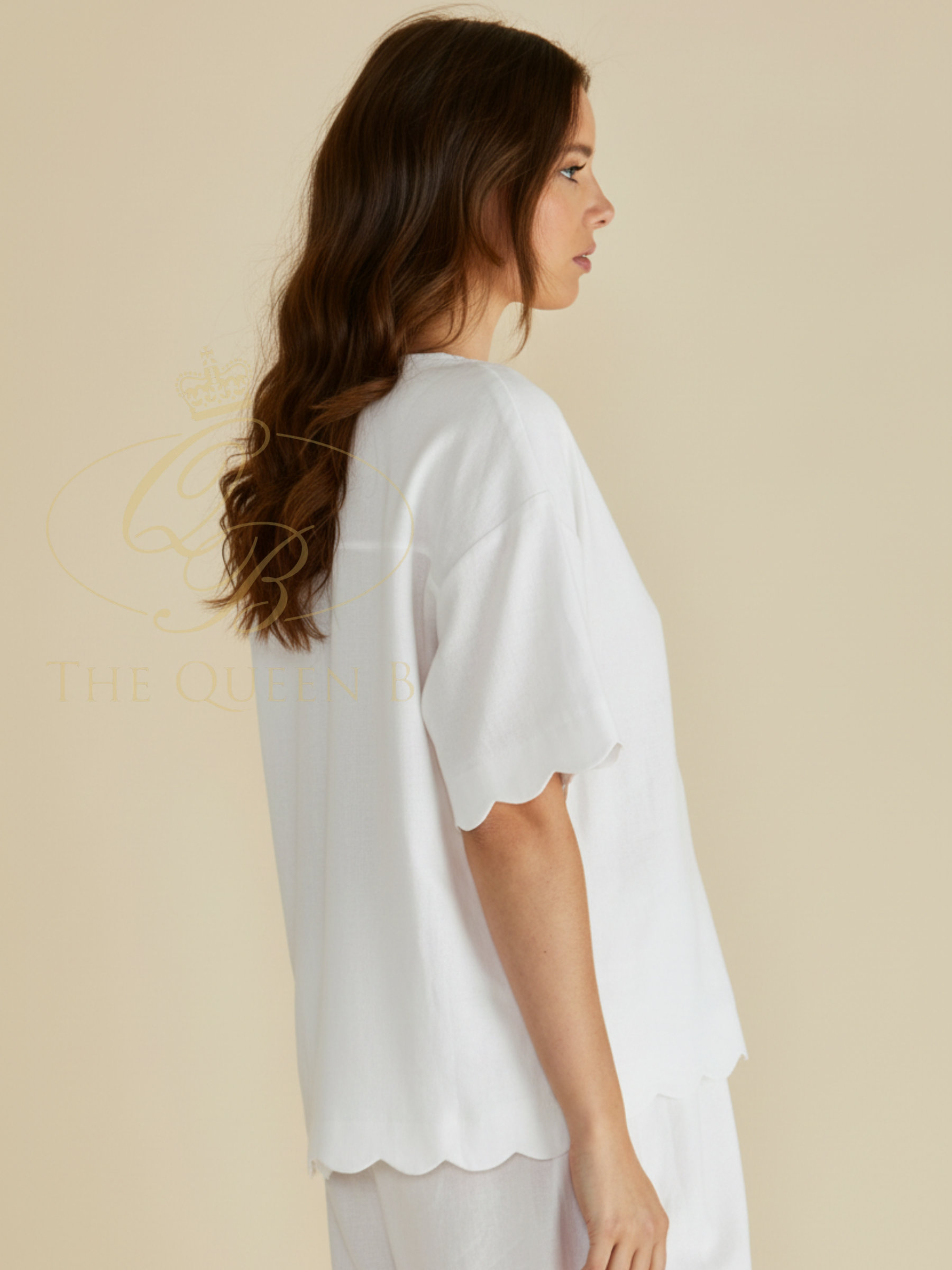 Betty Scarlett Shirt with V neckline, button-through front, short sleeves and scalloped hem.