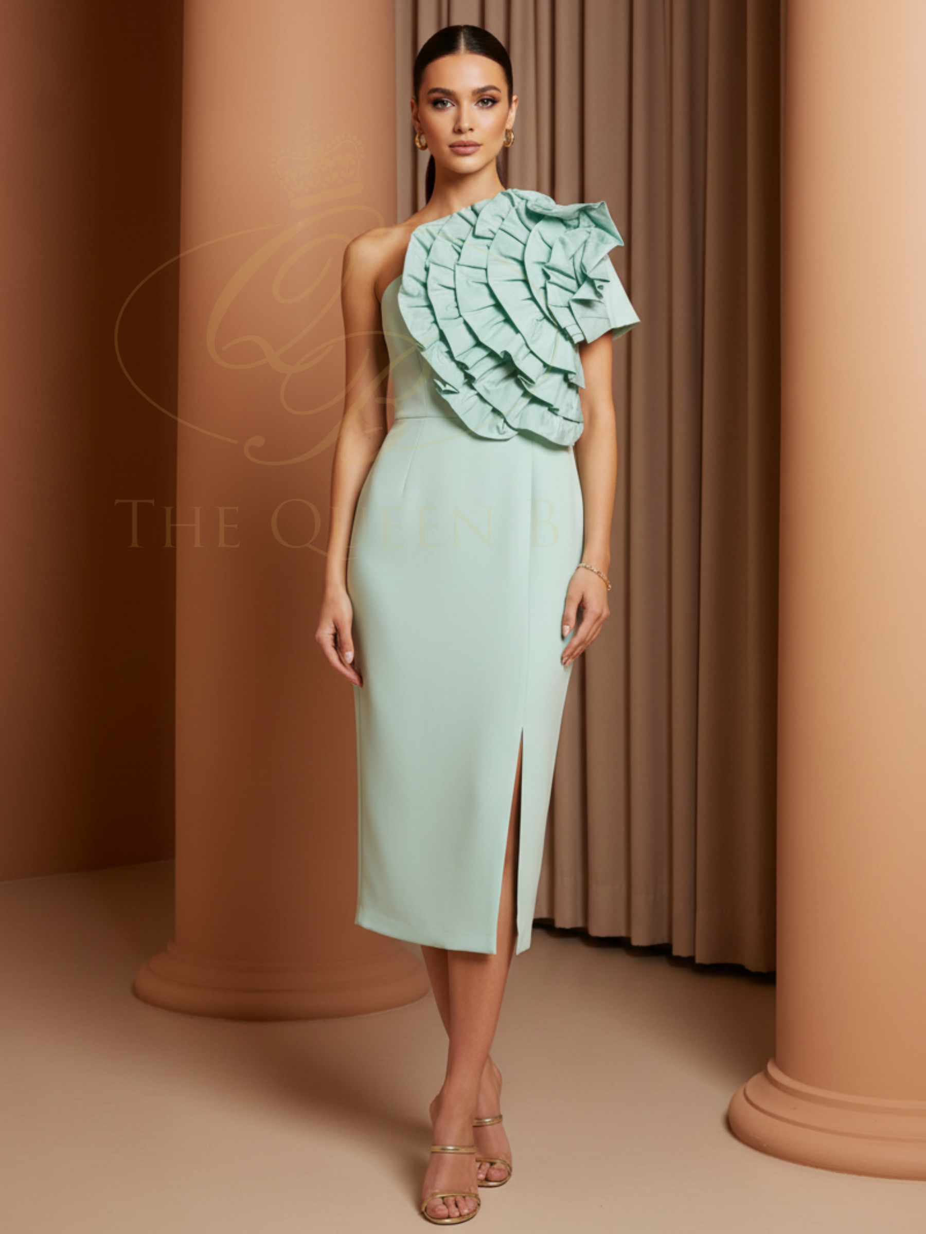 Carla Ruiz 52602 green one-shoulder sheath dress with statement ruffle detail and midi length.