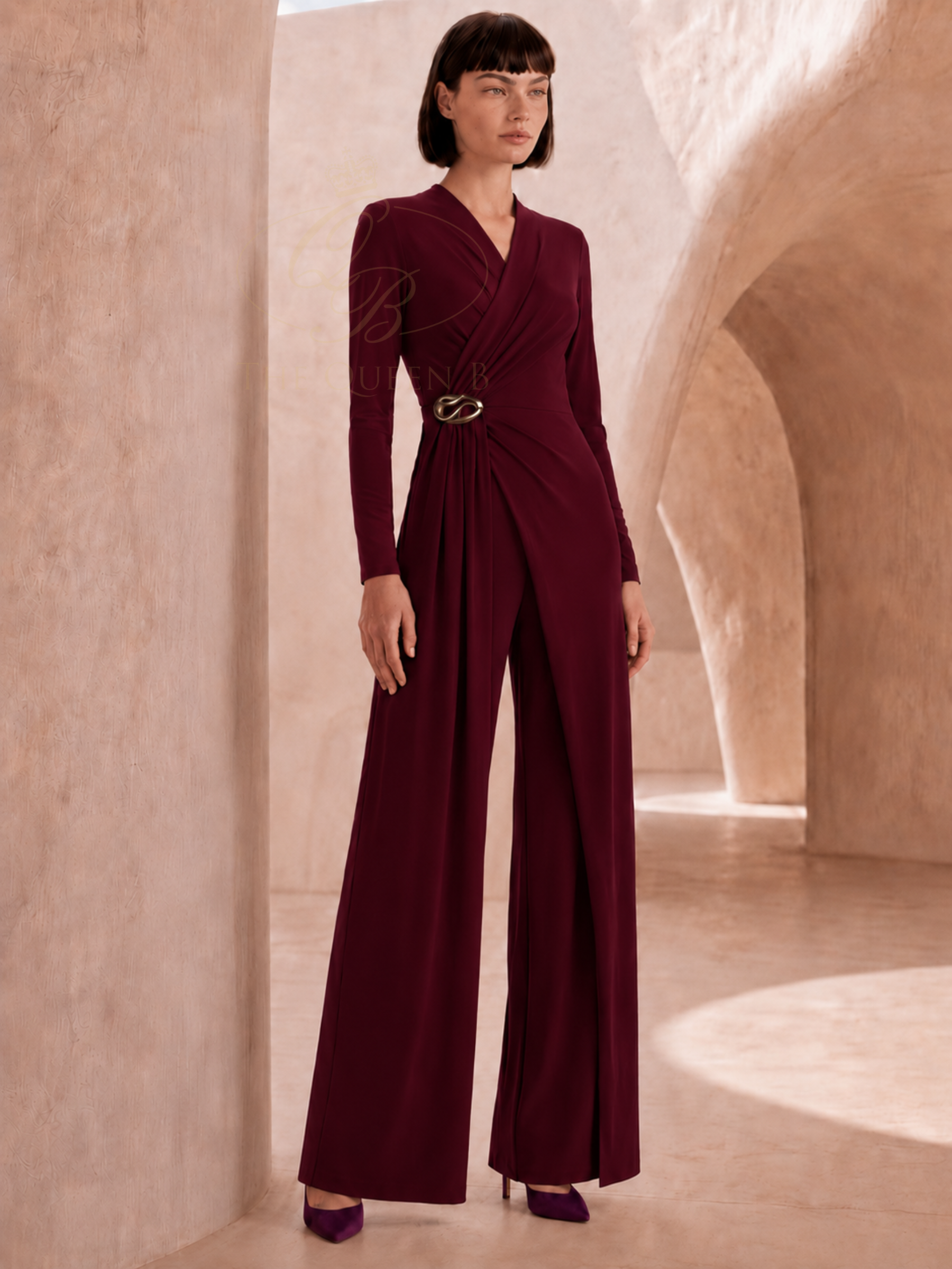 Carla Ruiz 53000 Burgundy Jumpsuit wrap-style occasion jumpsuit with long sleeves, side detail and wide leg trousers