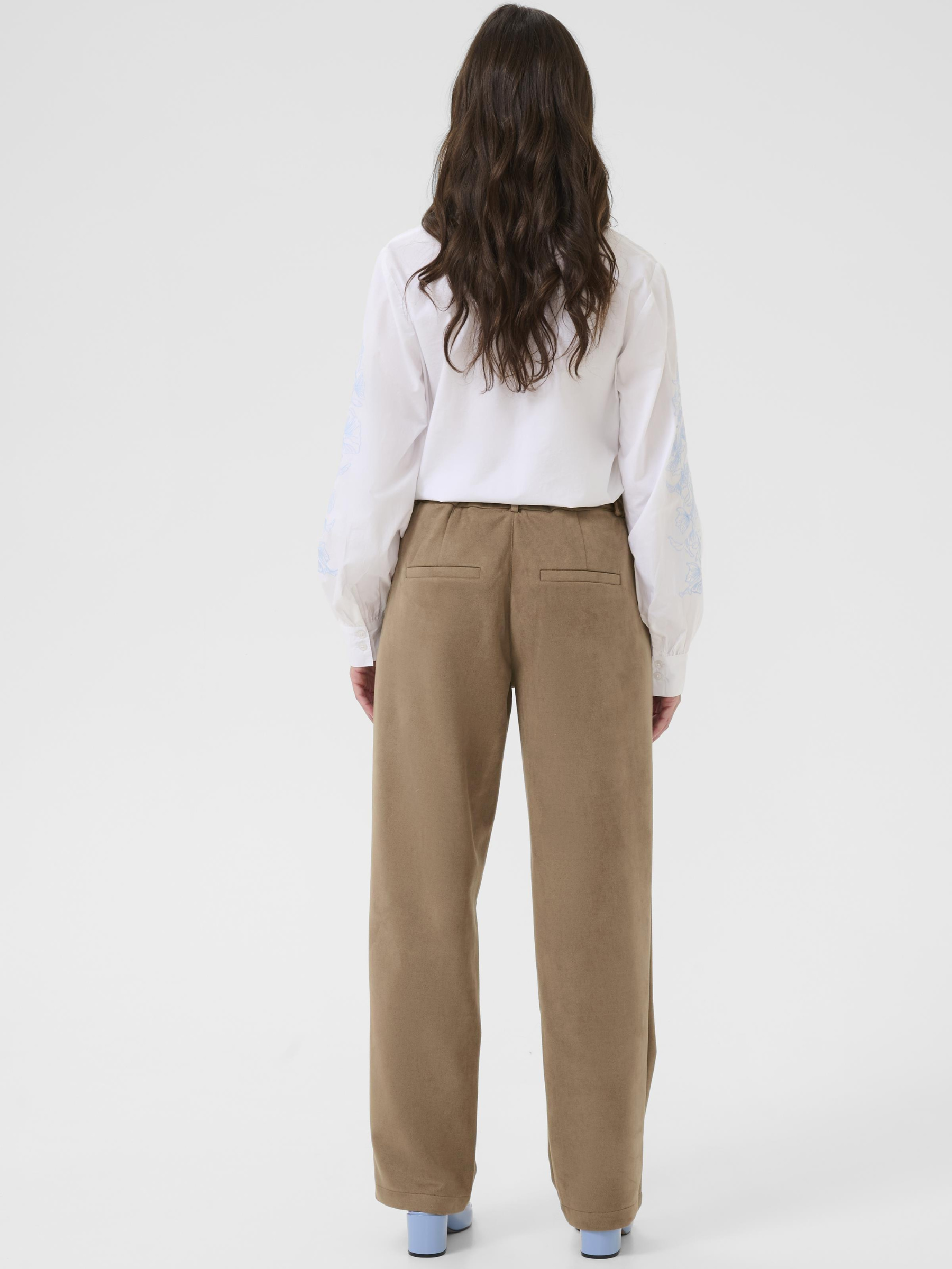 Cream Cala Pant women’s regular-fit full-length trousers with elastic waist and soft stretch fabric.