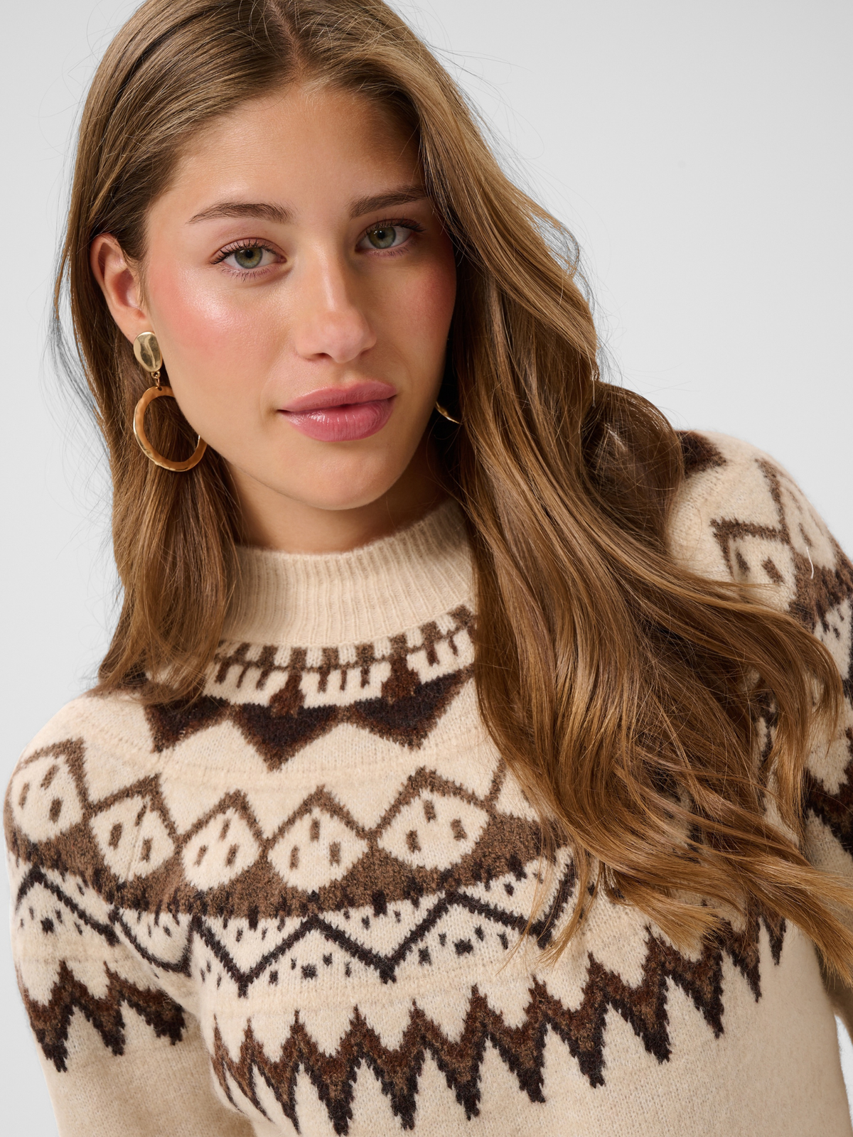 Cream Cherrie Pullover with round neckline, long sleeves, patterned yoke detail and relaxed hip-length fit