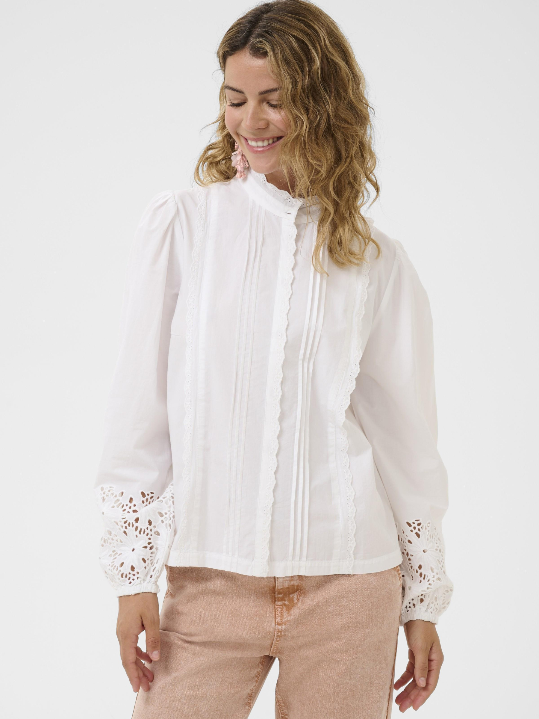 Cream Chloe Shirt women’s cotton blouse with regular fit and hip-length design for elegant everyday wear.