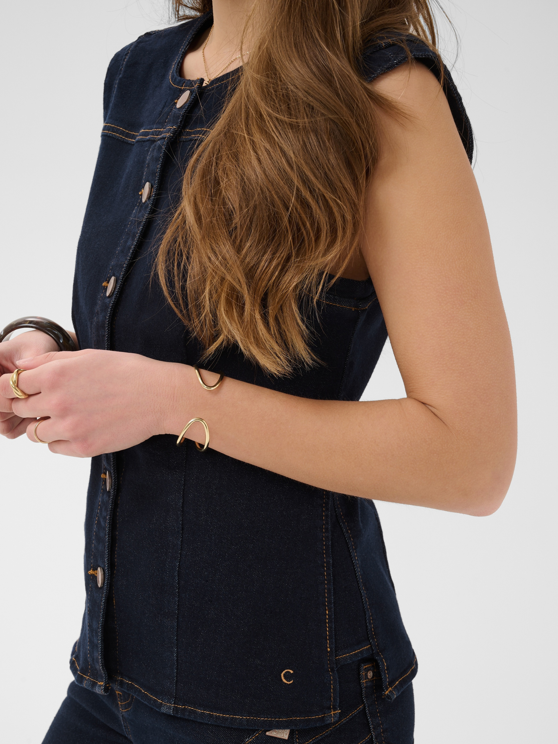 Cream Damy Denim Waistcoat fitted sleeveless denim waistcoat with button front.