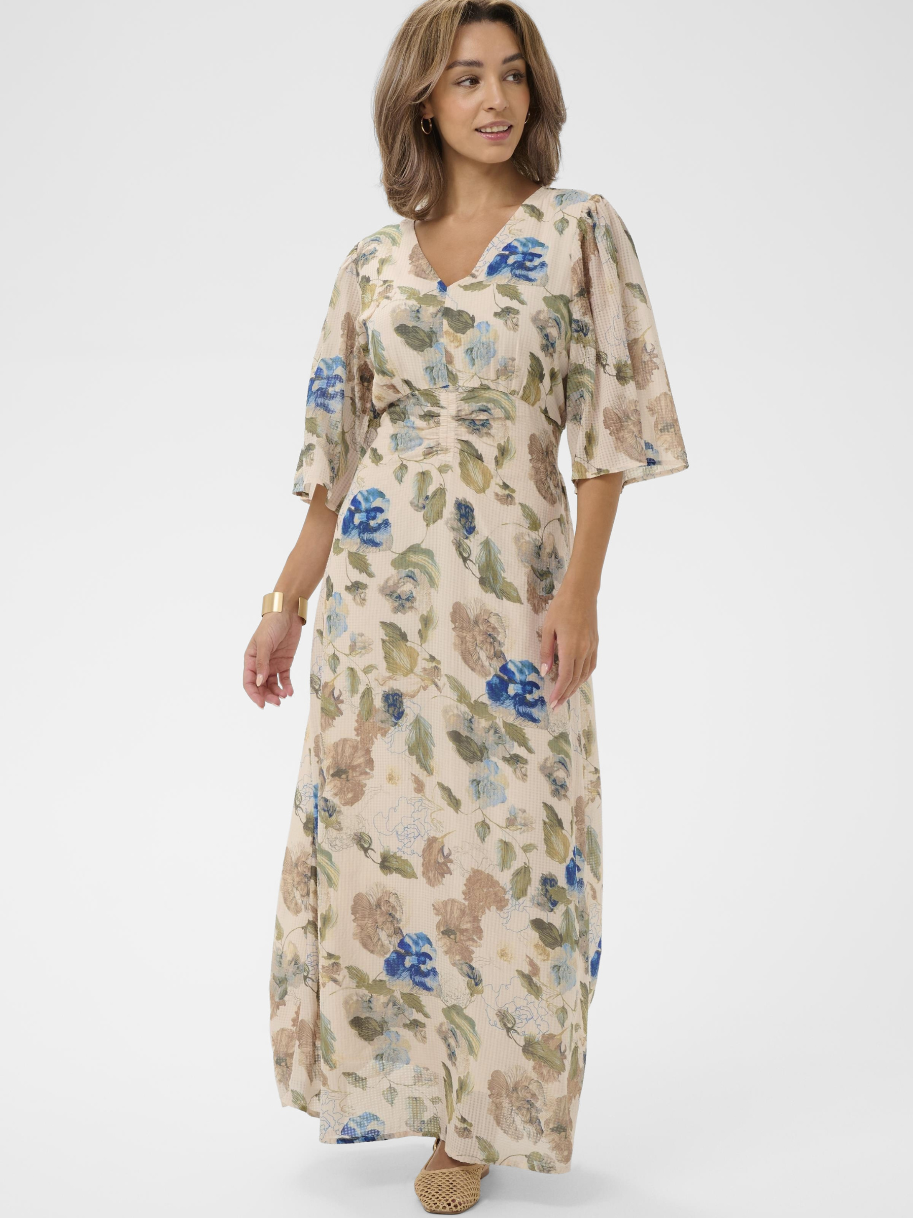 Cream Hailey long floral maxi dress with V-neckline and elbow-length sleeves in lightweight viscose cotton blend.