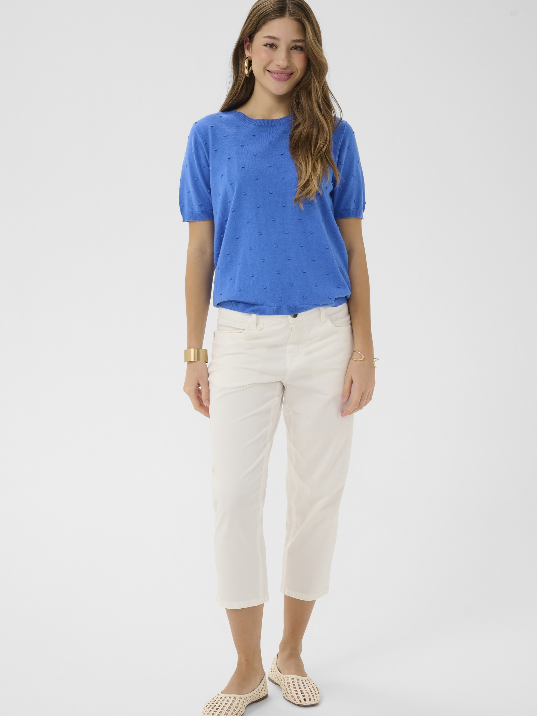 Cream Hanne Knit Pullover lightweight short sleeve textured knit with round neckline.