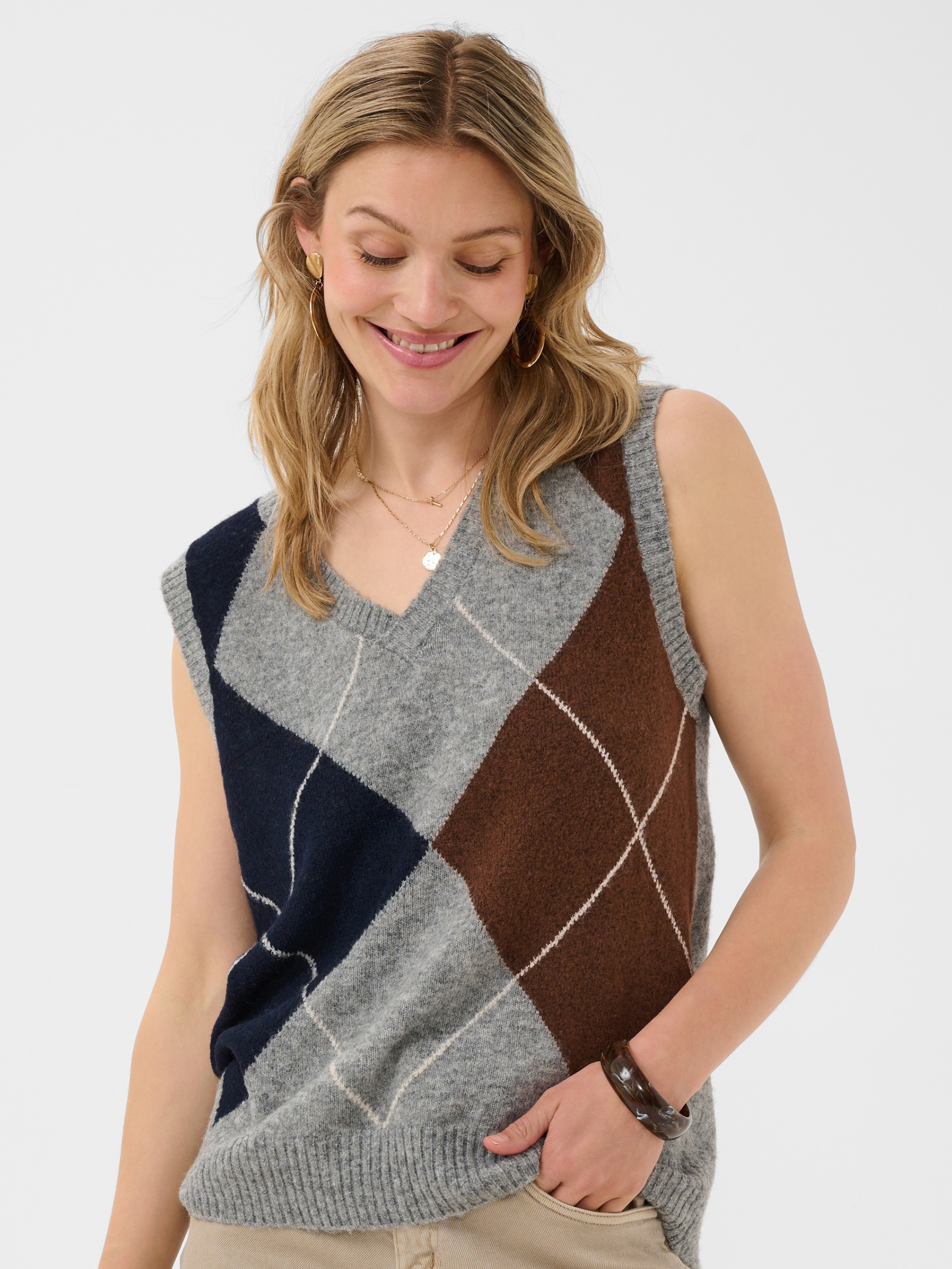 Cream Hope Knit Slipover with V-neckline, sleeveless shape, argyle-style pattern and ribbed trims