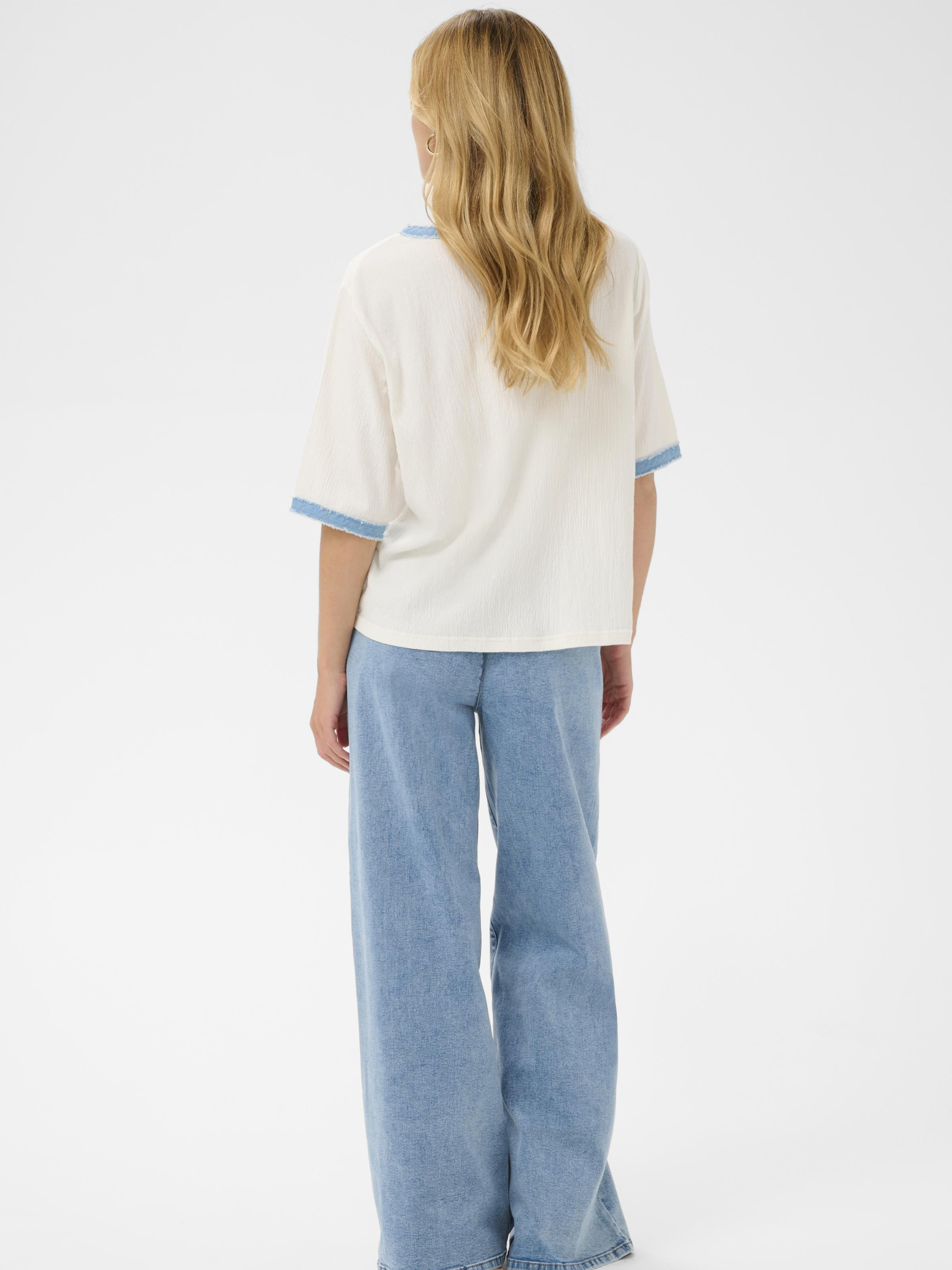 Cream Katti T-Shirt with contrast trim detail, short sleeves and decorative gold-tone buttons.