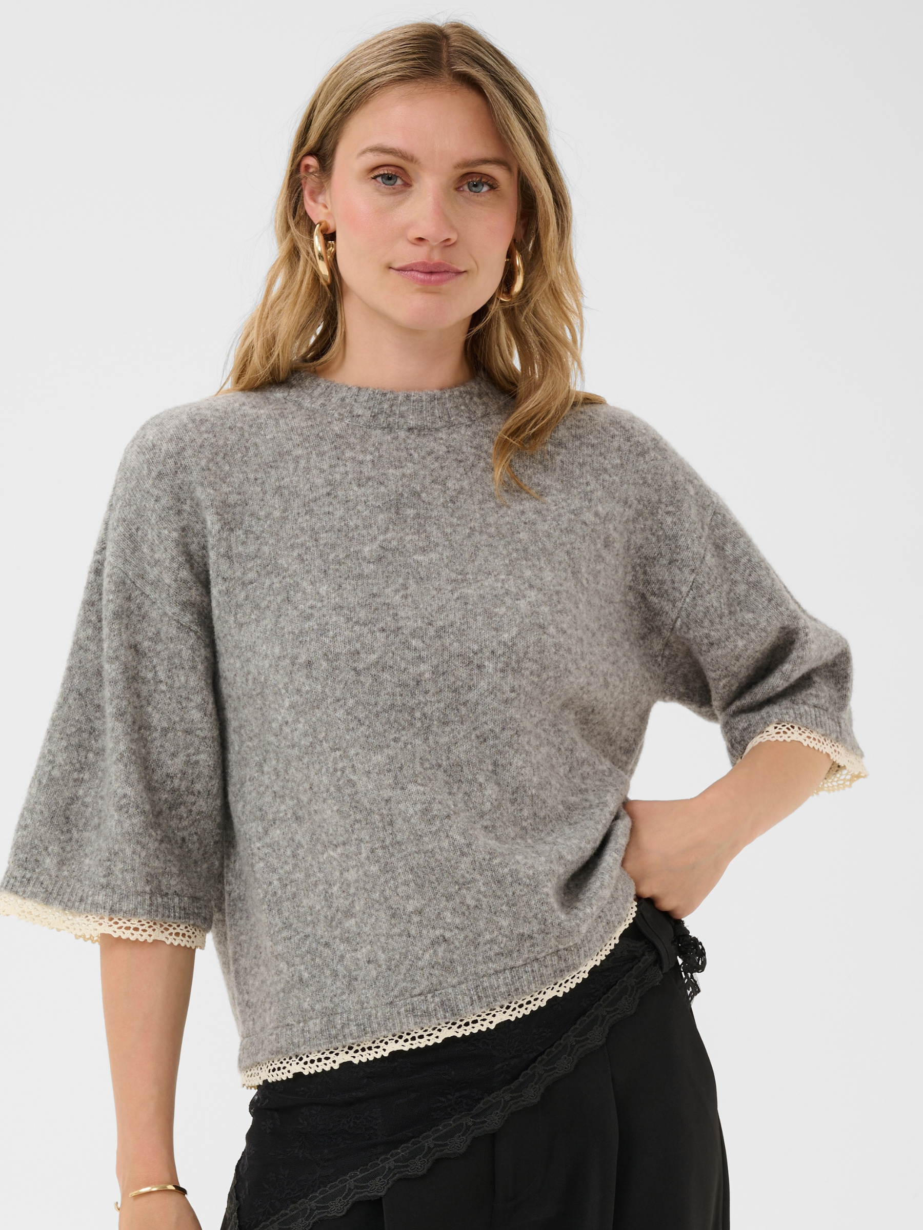 Cream Kibana Knit Pullover with round neckline, relaxed sleeves, lace trim and short length