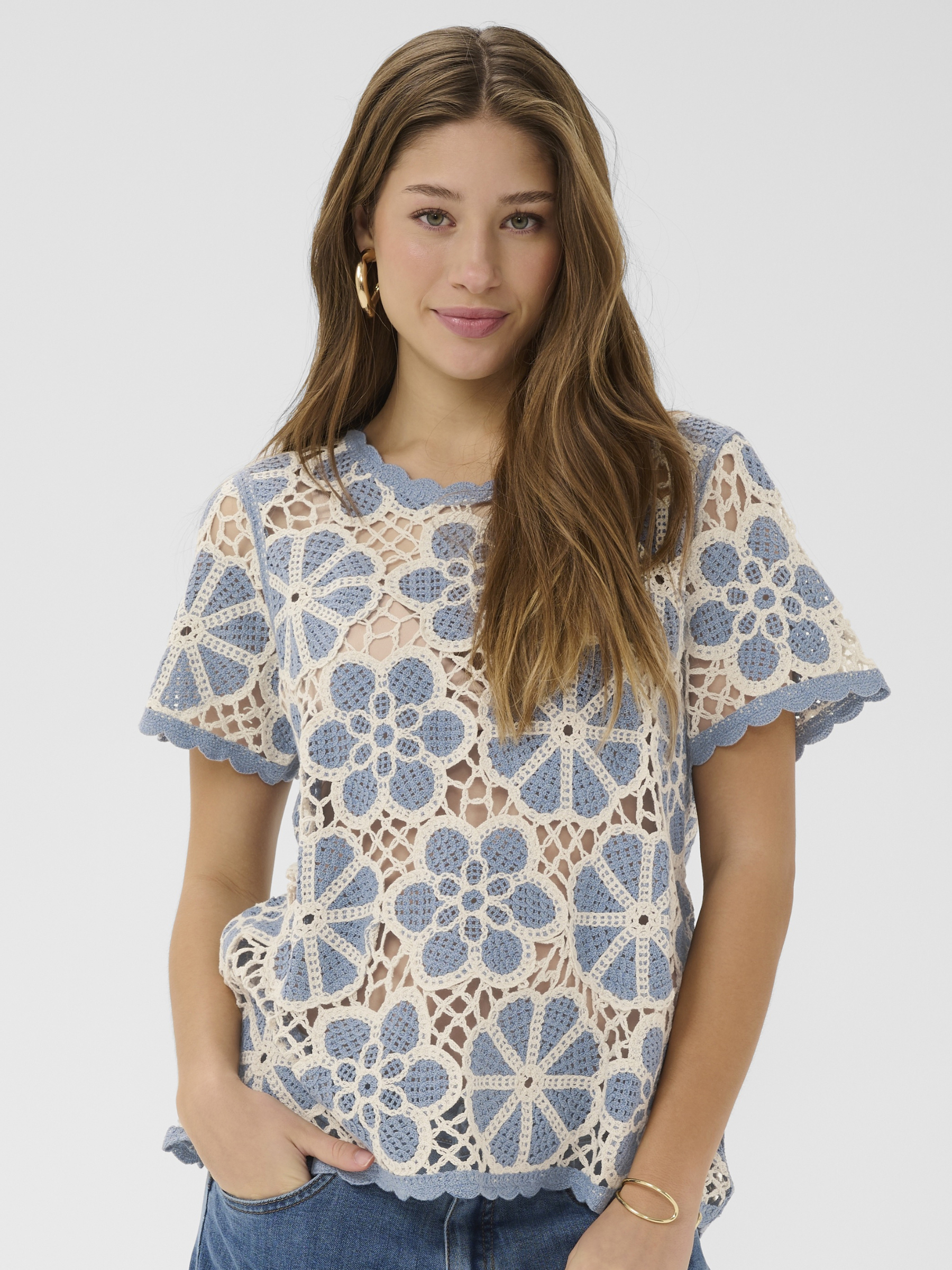 Cream Mallica Crochet Blouse with intricate crochet pattern, short sleeves and regular fit.