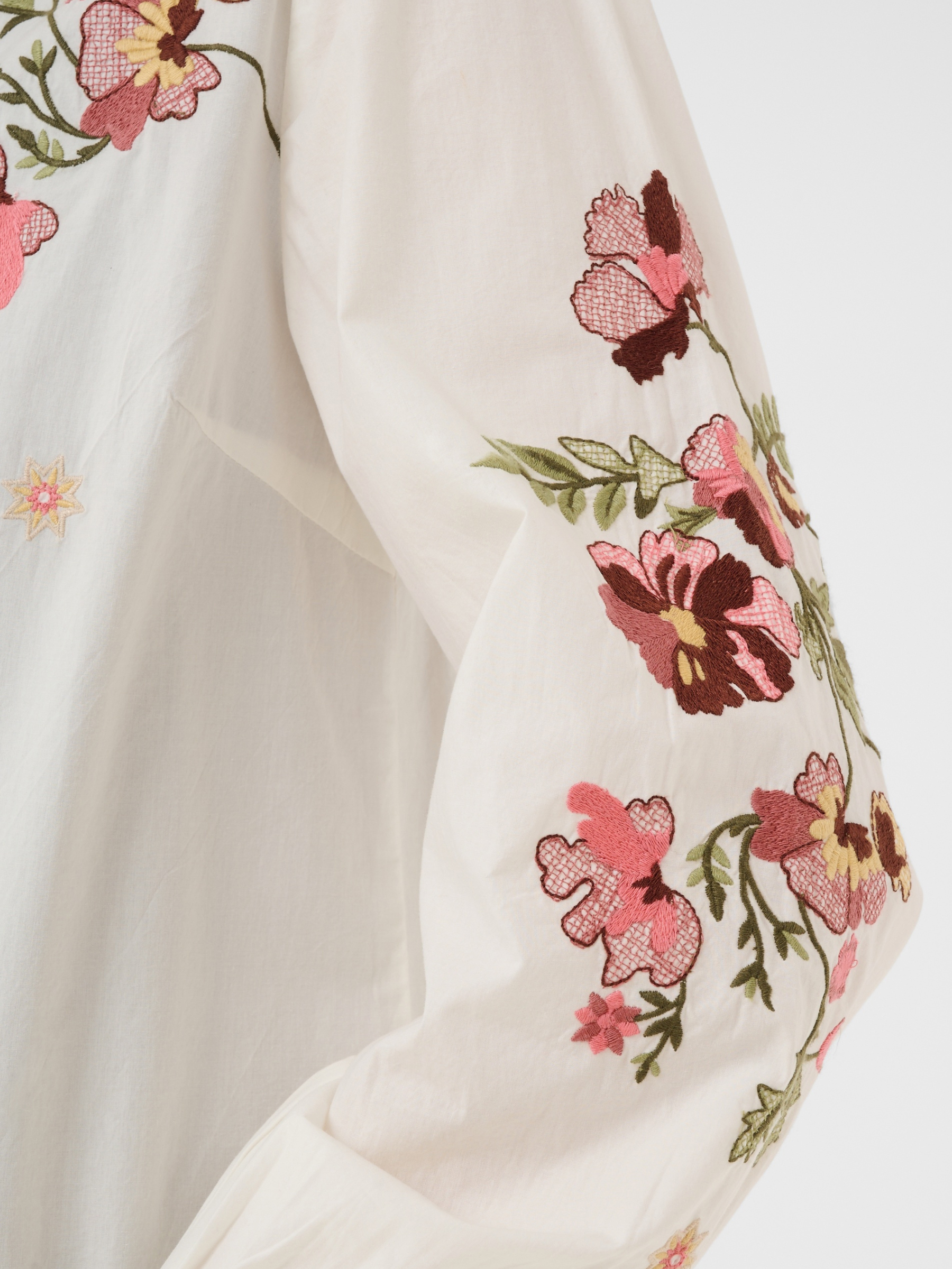 Cream Peona Shirt with collared neckline, floral embroidery, button front and long sleeves