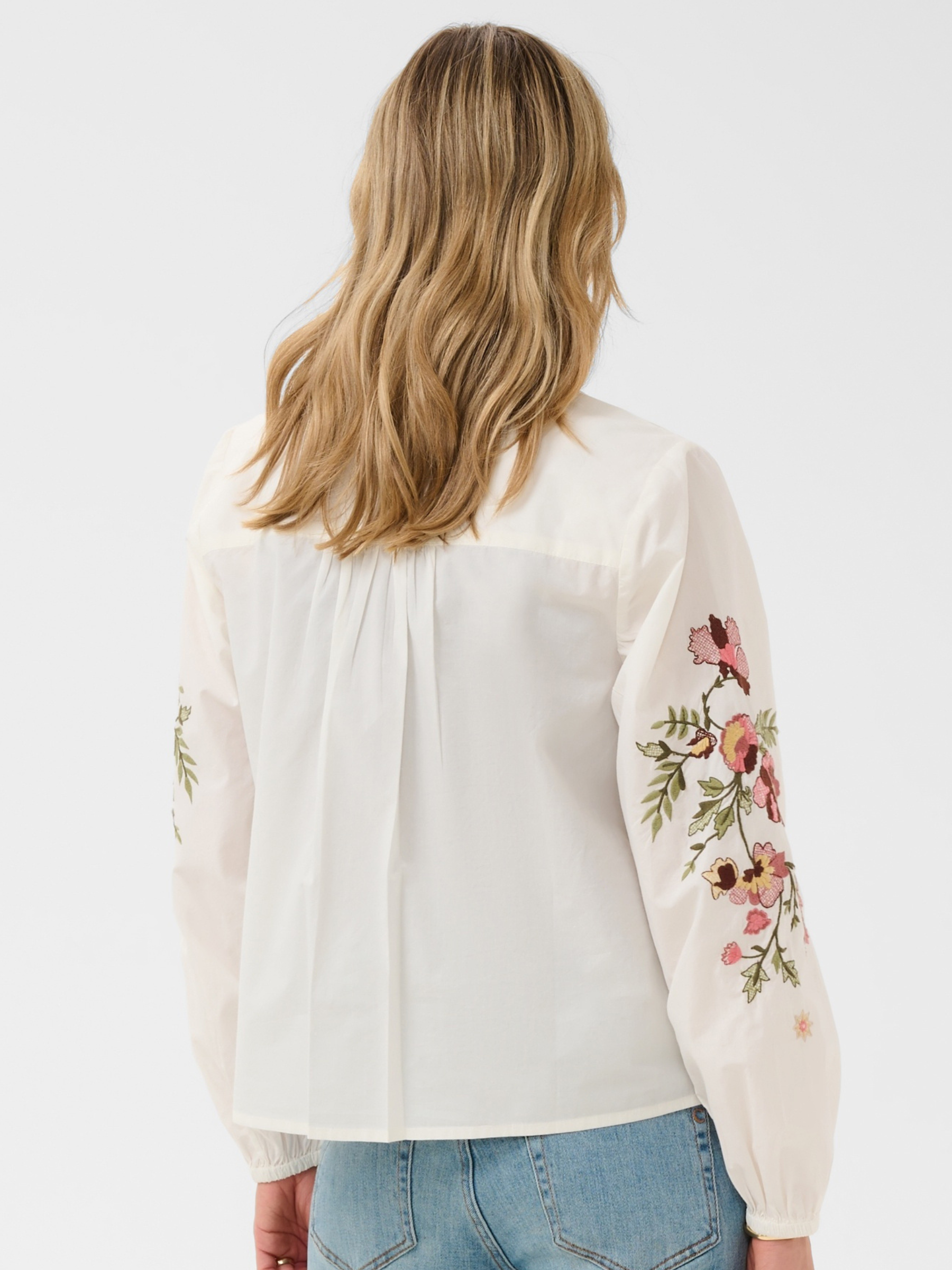 Cream Peona Shirt with collared neckline, floral embroidery, button front and long sleeves