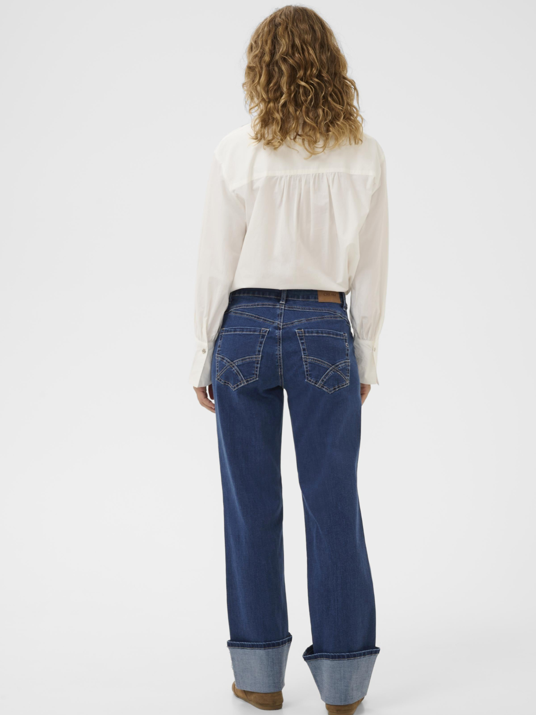 Cream Ranja women’s curved fit jeans with regular waist, full-length leg and stretch denim fabric.