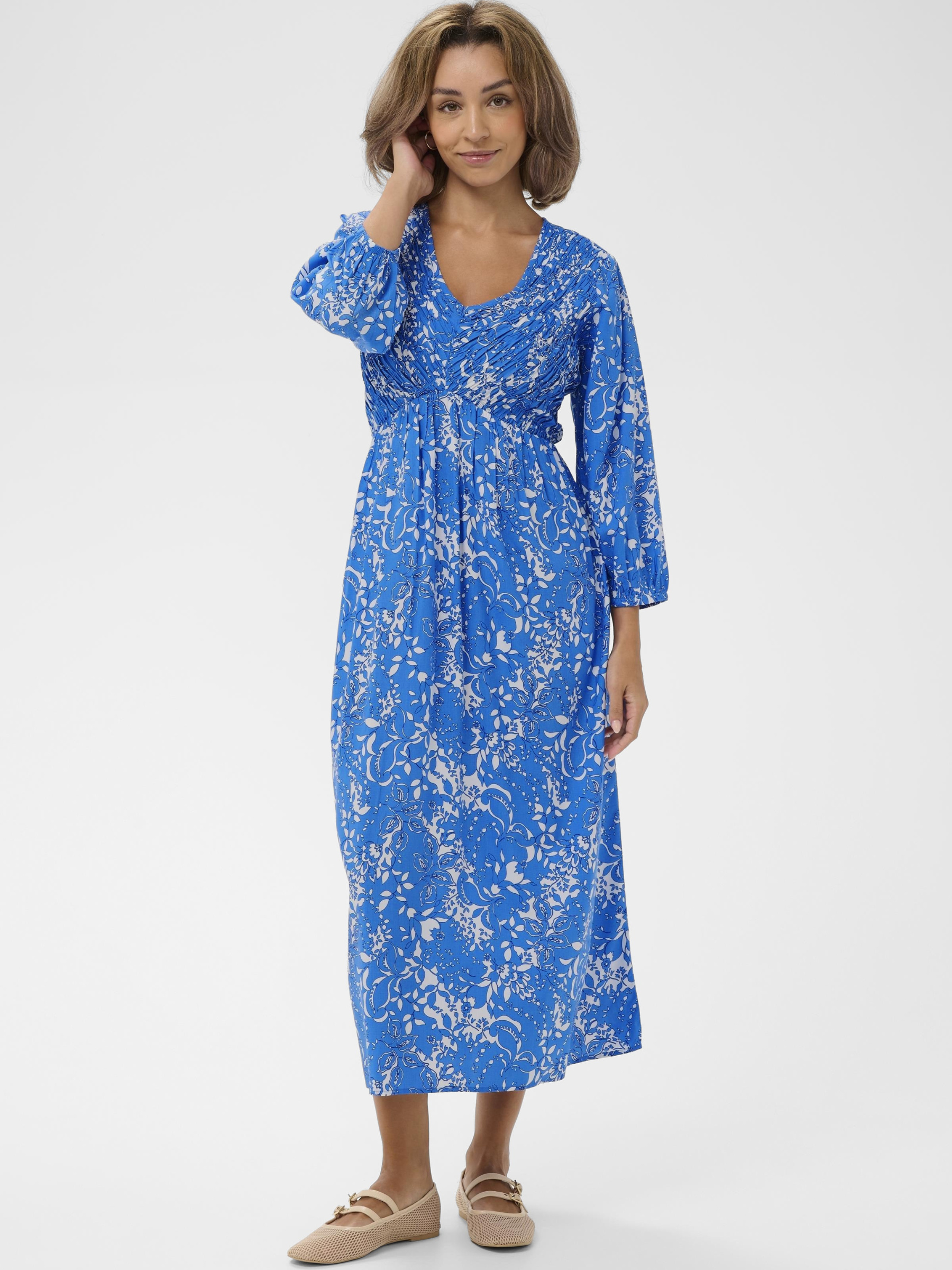 Cream Tiah Smock Dress printed midi dress with V-neckline, empire waist and three-quarter sleeves.