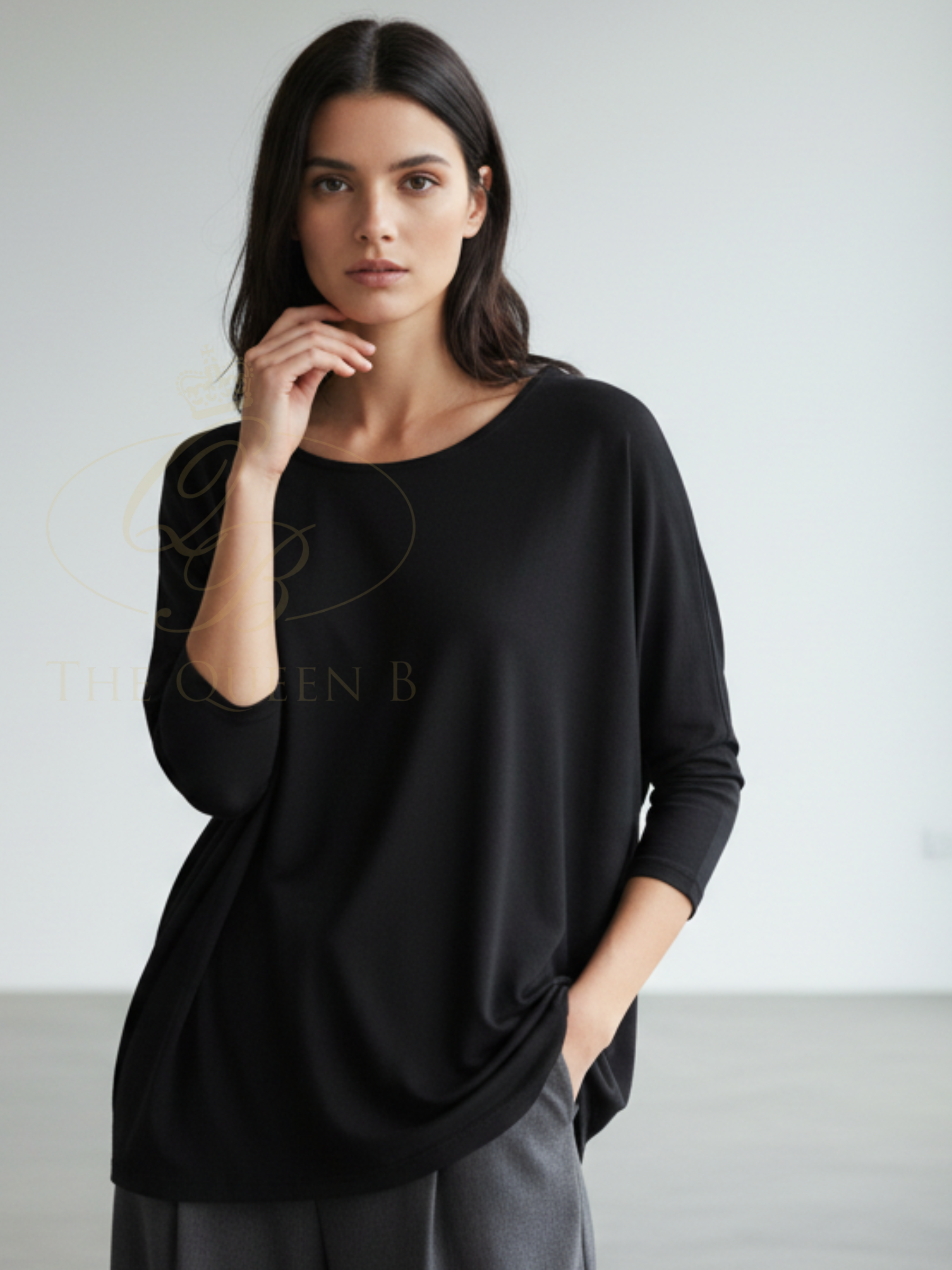 Deck By Decollage 2731 women’s relaxed fit top with round neckline and three-quarter sleeves.