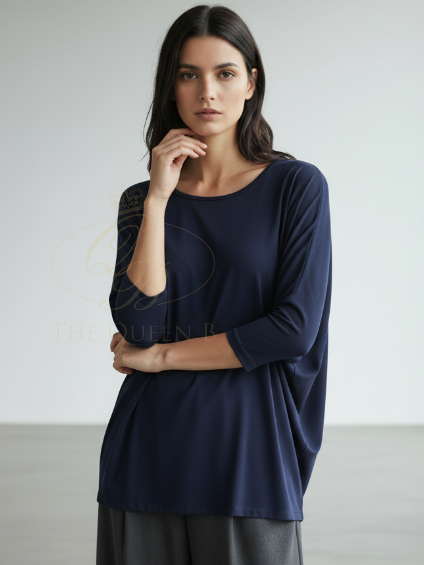 Deck By Decollage 2731 women’s relaxed fit top with round neckline and three-quarter sleeves.