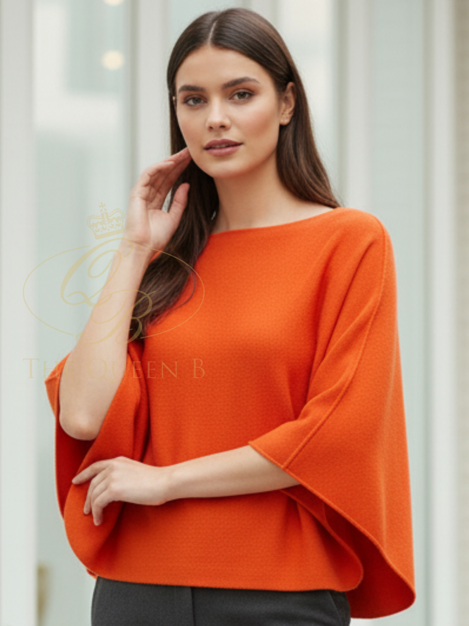 Deck By Decollage 57702 wide boat neck batwing knit top with relaxed draped silhouette.