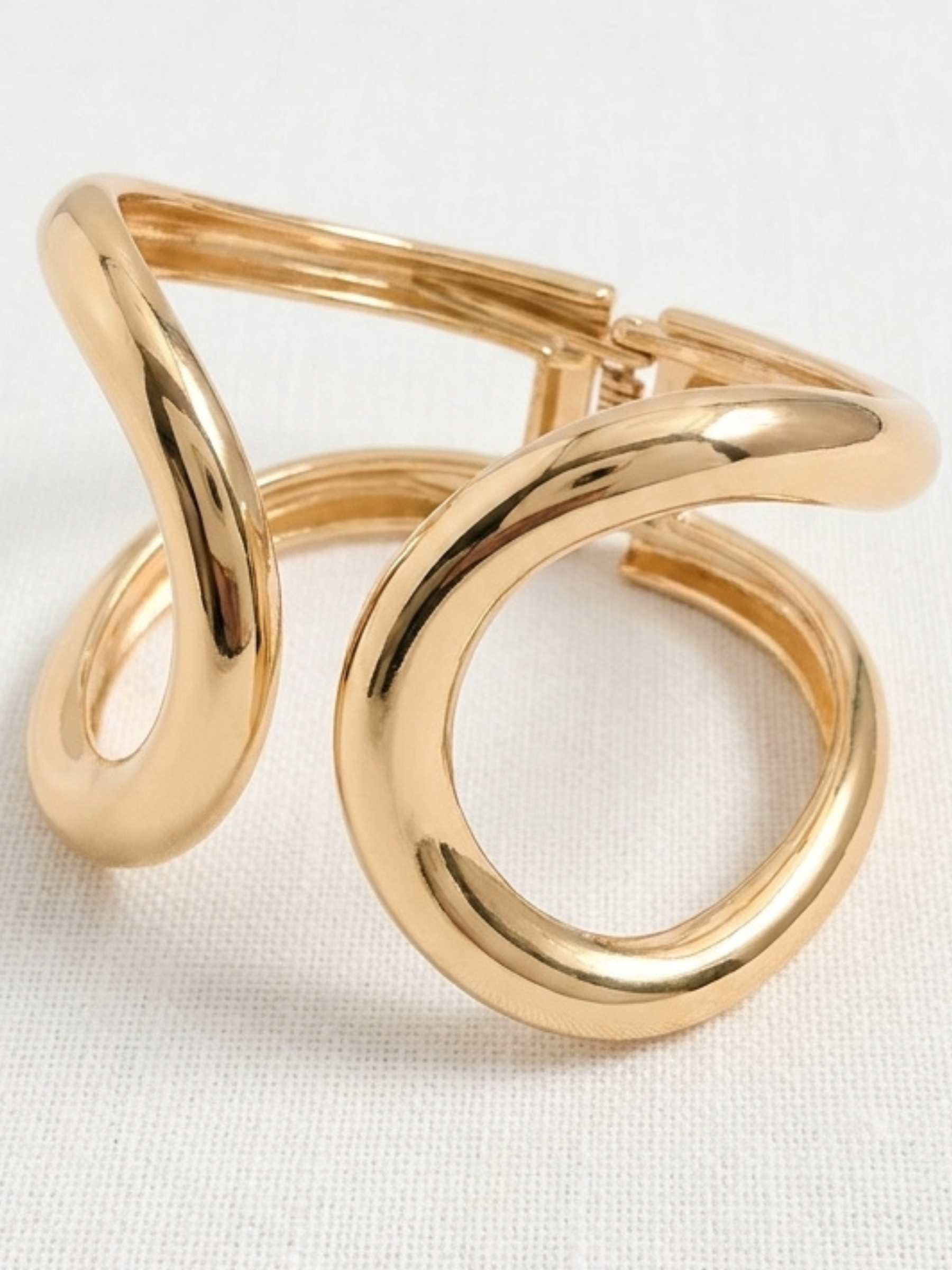 Envy 4707 Double Looped Hinged Bangle Bracelet with sculptural double-loop design and smooth polished finish.