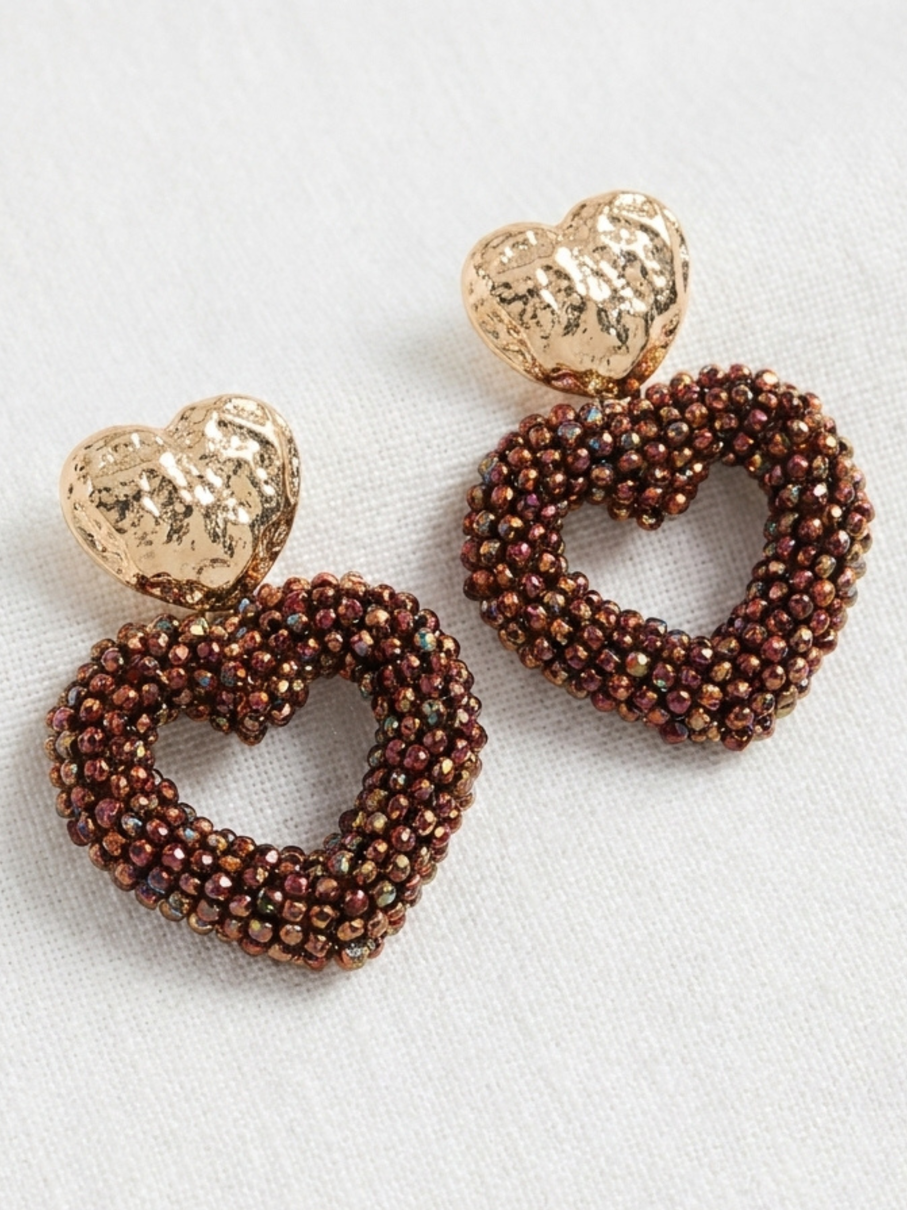 Envy 4734 Heart Shaped Faceted Beaded Earrings with textured heart studs and open heart drops covered in faceted beads.