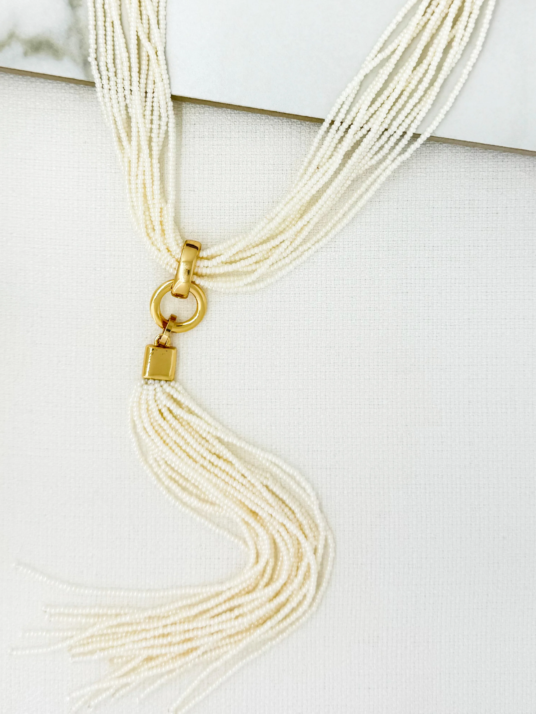 Envy 4863 Linked Bugle Tassel Necklace with multi-strand beading and tassel drop.
