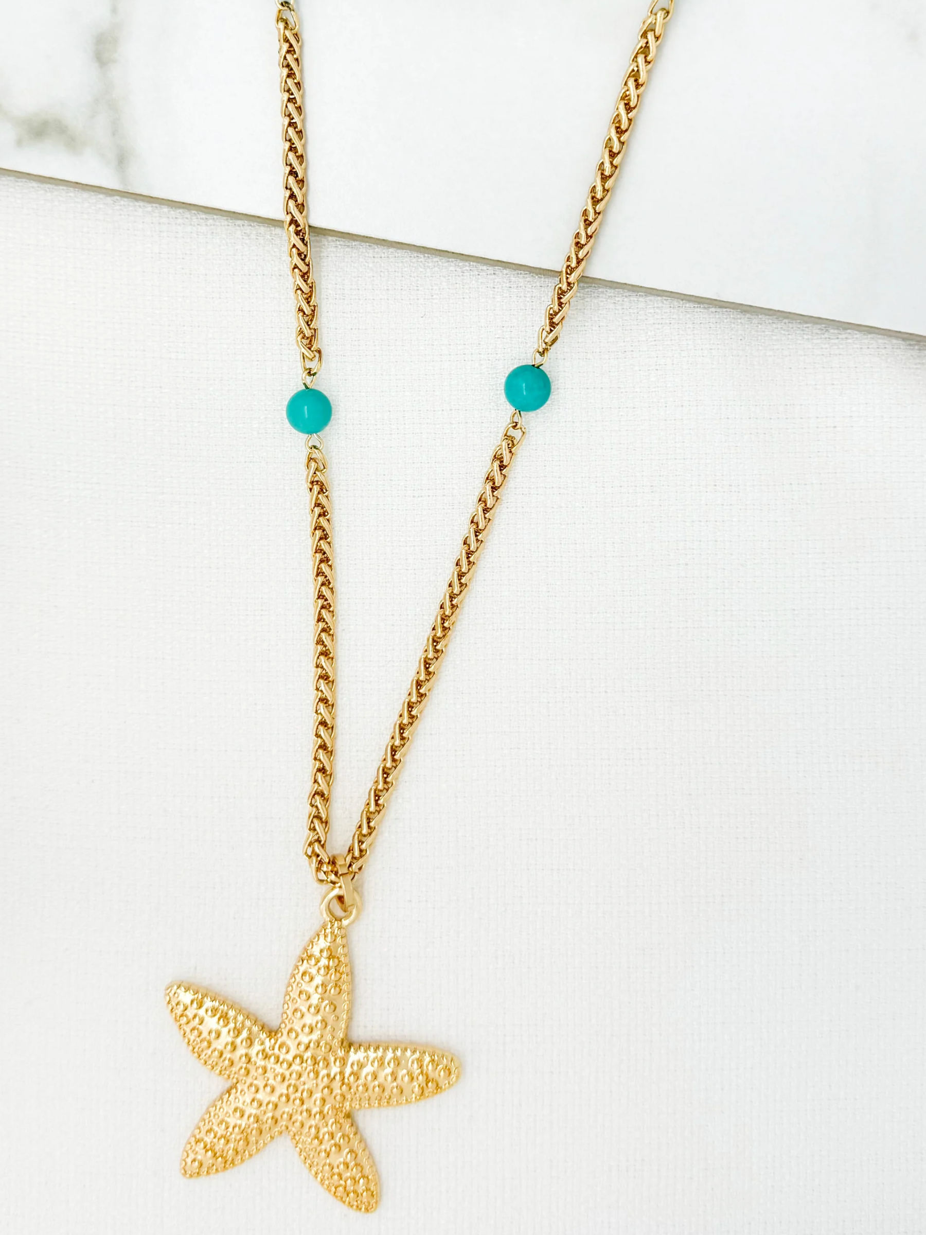 Envy 4930 Starfish Pendant Long Chain Necklace with starfish pendant and long chain design.