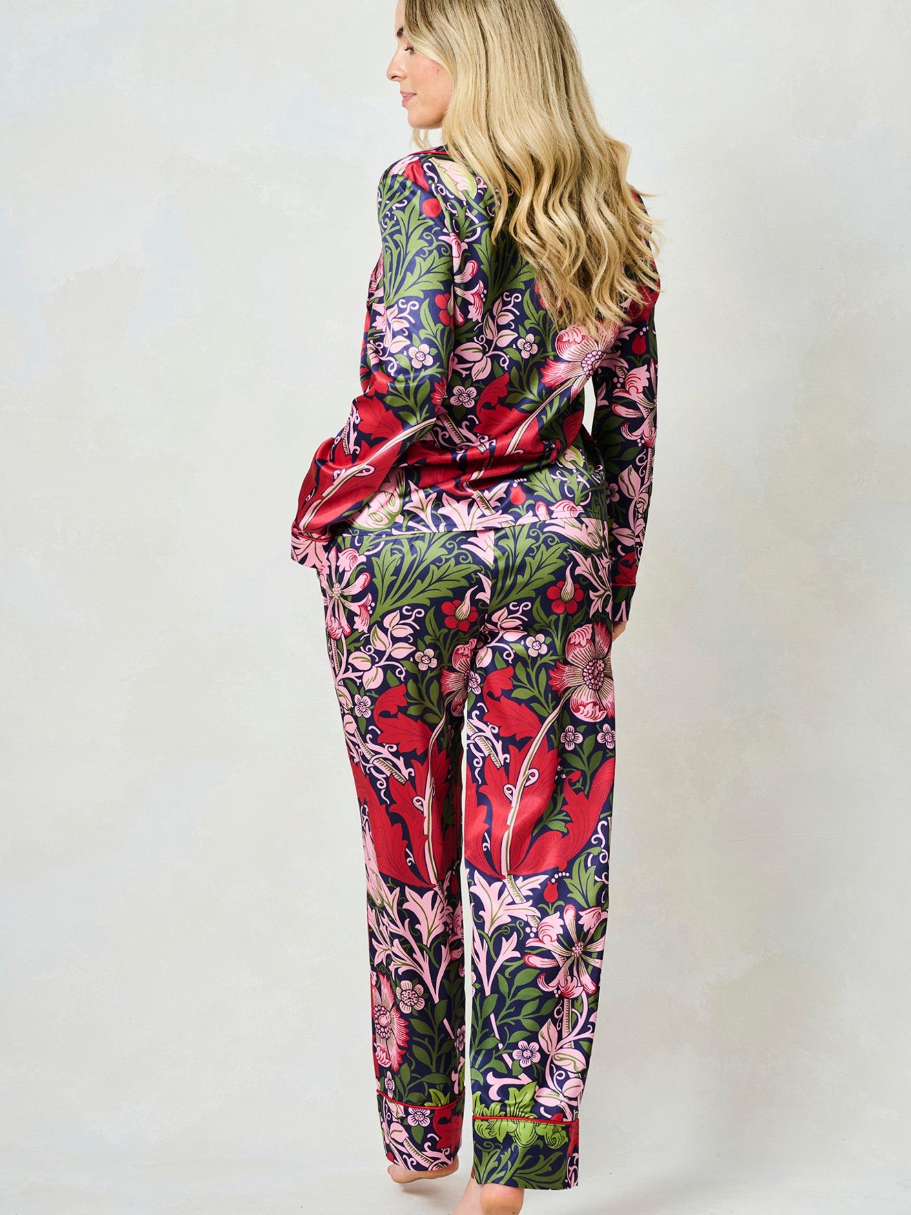 Hope & Ivy Marianna Silk Compton Pyjamas – luxury satin pyjama set featuring William Morris’ Compton print with red piping, includes matching fabric bag, perfect for gifting or lounging.