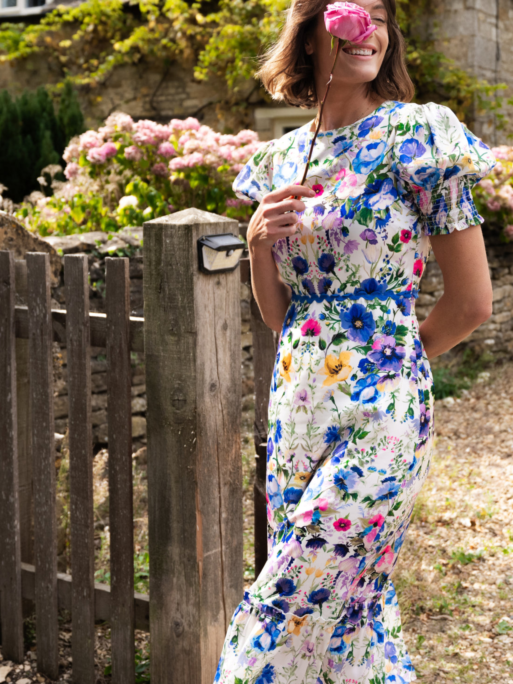 Hope & Ivy Charlotte-Ann White / Blue Multi Dress with floral print, puff sleeves, bow back and flowing silhouette.