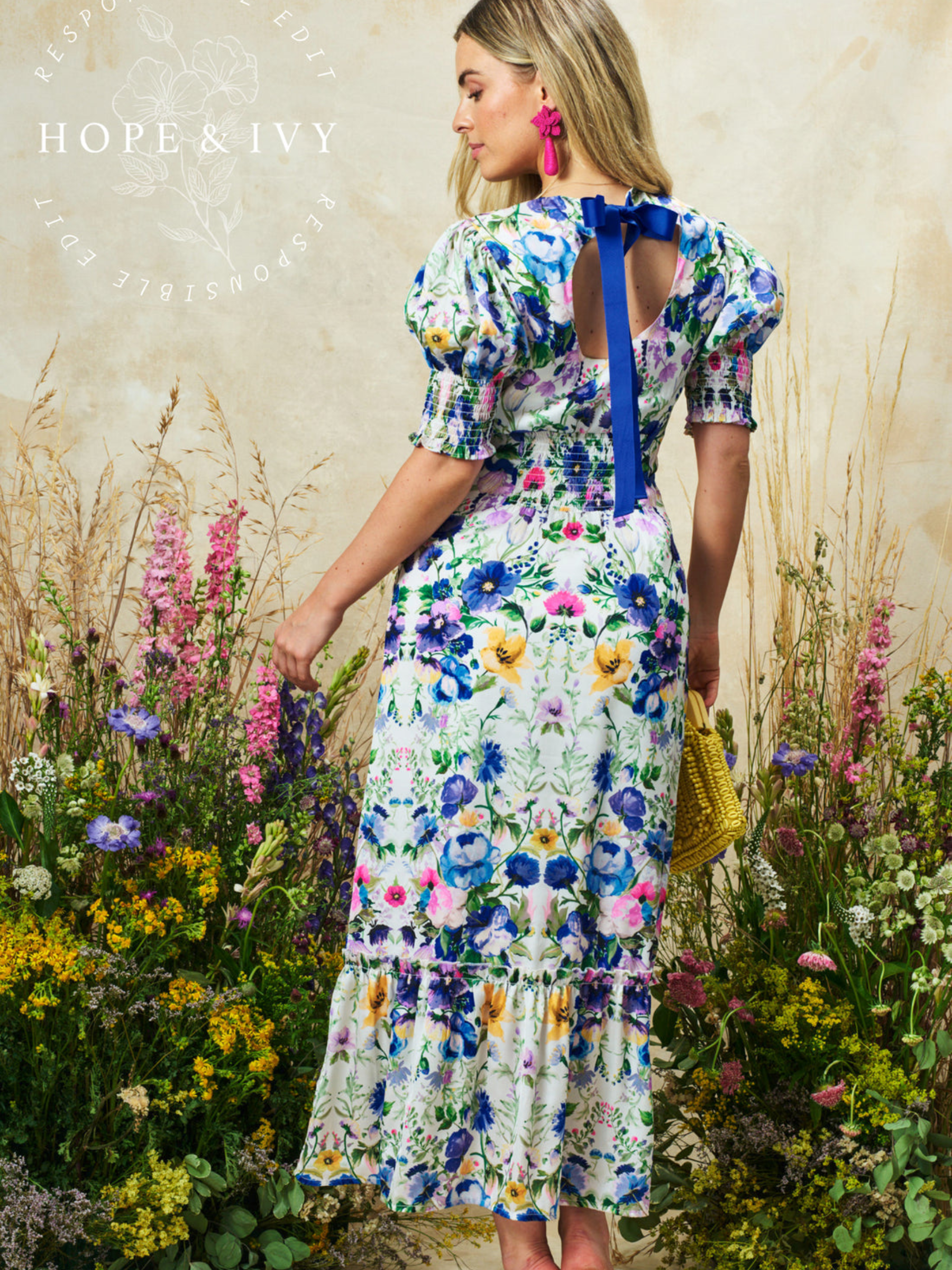 Hope & Ivy Charlotte-Ann White / Blue Multi Dress with floral print, puff sleeves, bow back and flowing silhouette.