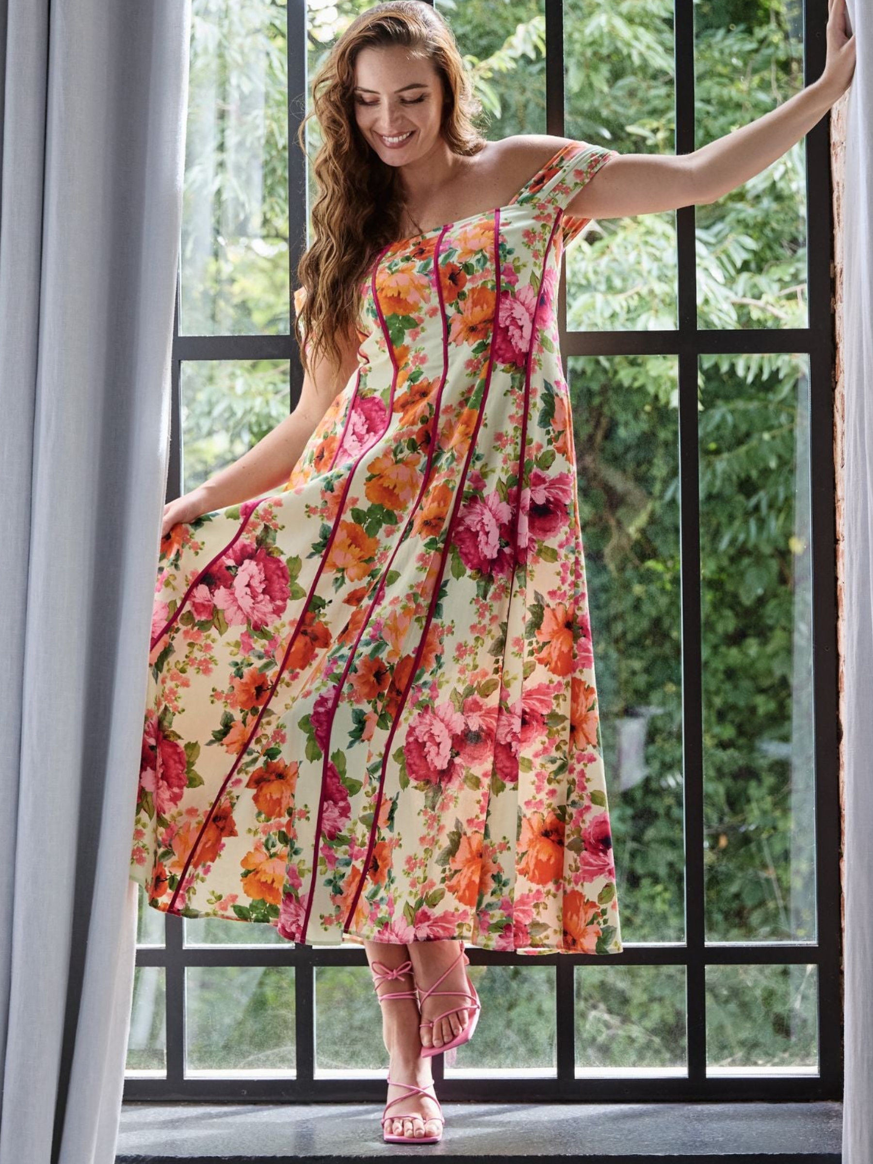 Hope & Ivy Shannon Green Floral Dress with bardot neckline, corseted bodice and midi length floral silhouette.