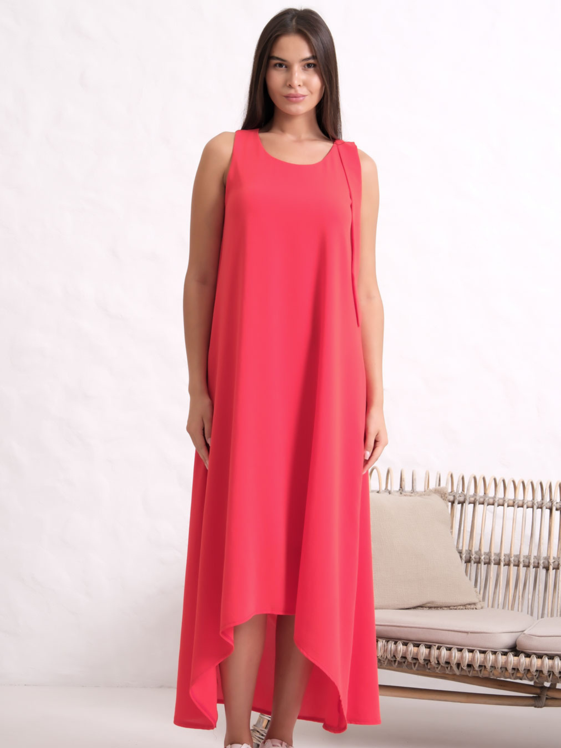 Inco 2155 Sleeveless Dress with A-line silhouette, round neckline and asymmetric hemline.