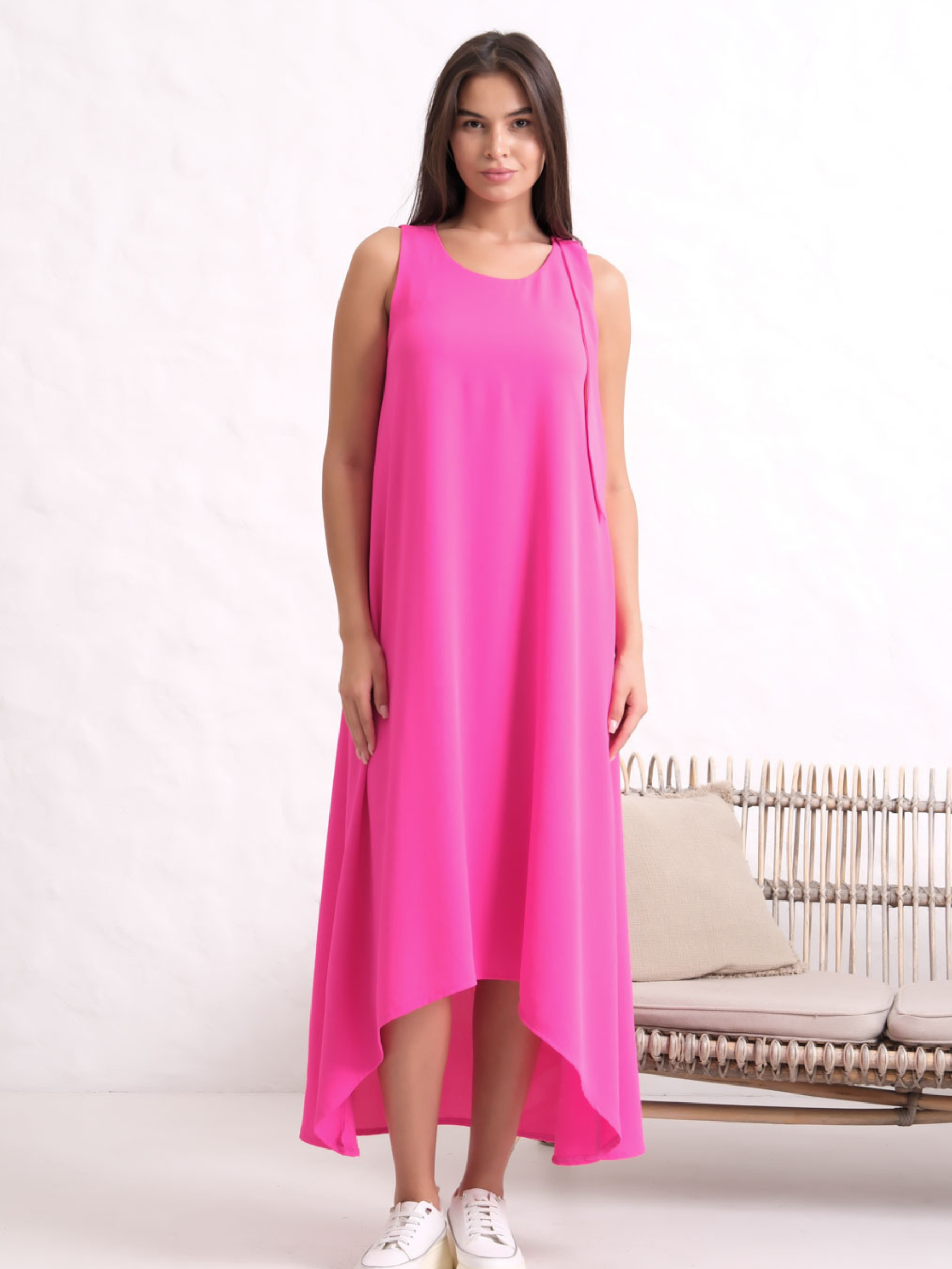 Inco 2155 Sleeveless Dress with A-line silhouette, round neckline and asymmetric hemline.