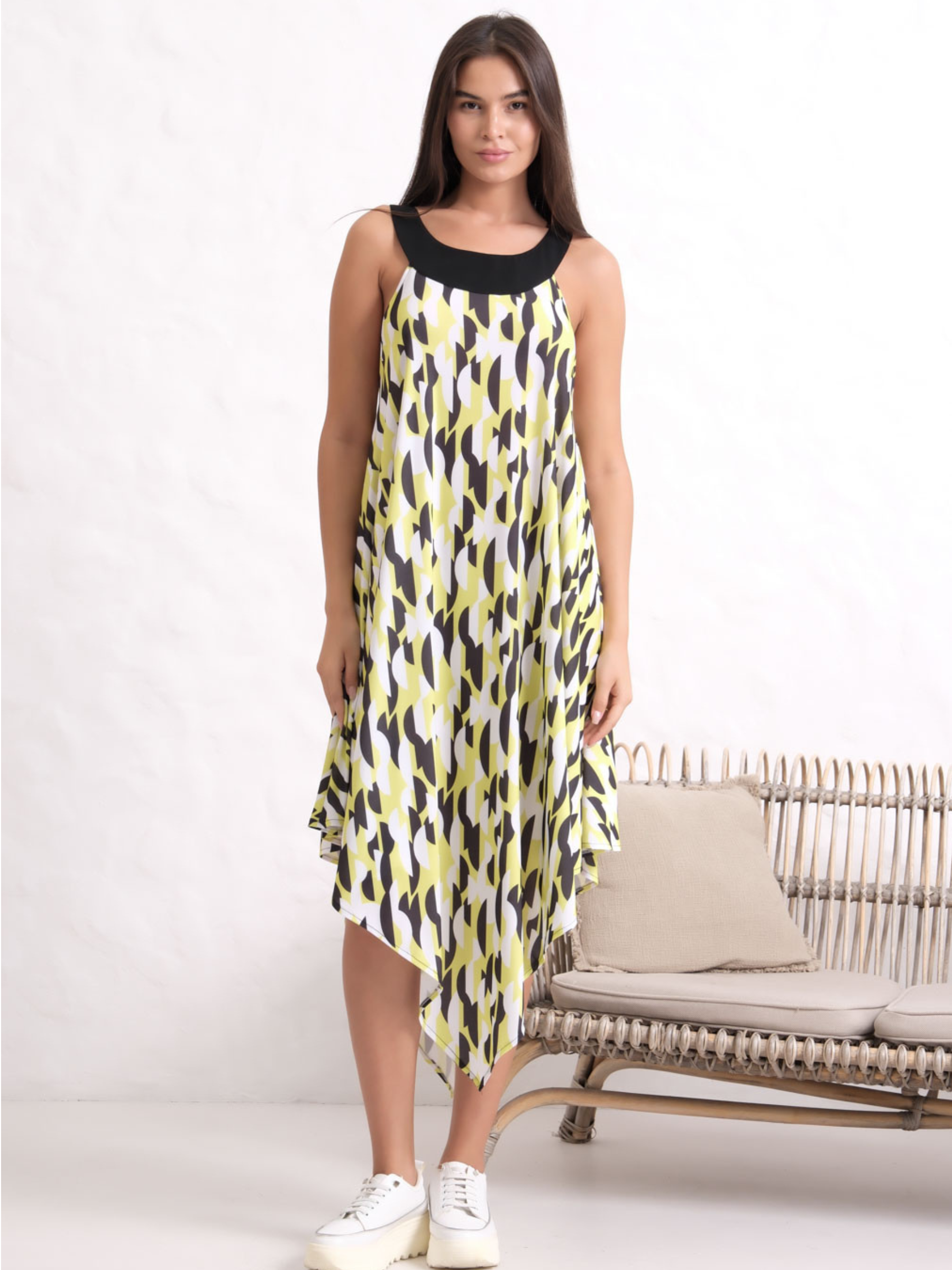 Inco 2168 Sleeveless Dress with abstract print, round neckline and asymmetric hemline.