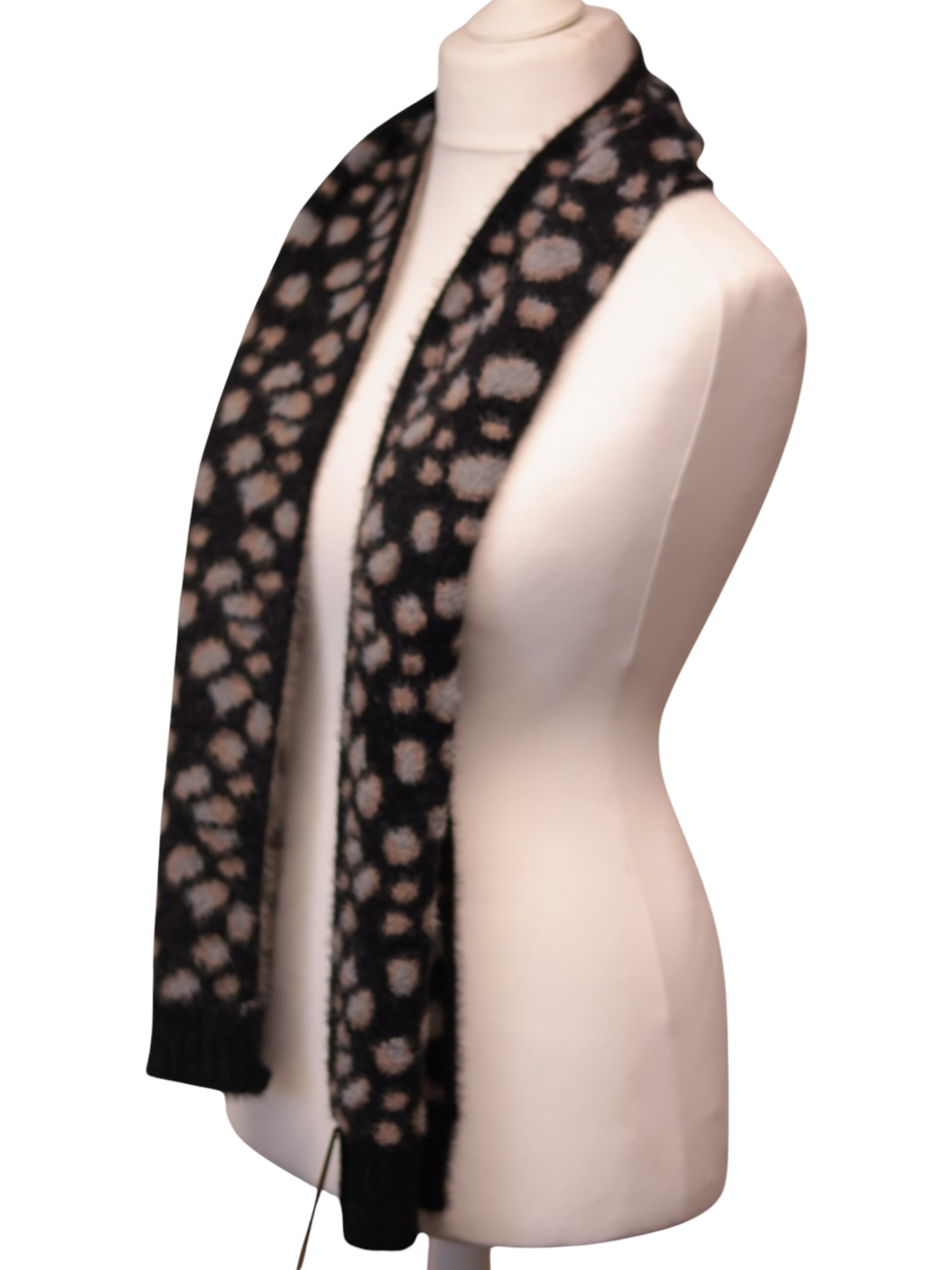 Jess & Lou AS101 Leopard Pull Though Fluffy Scarf in a soft fluffy knit with leopard print and pull-through design.