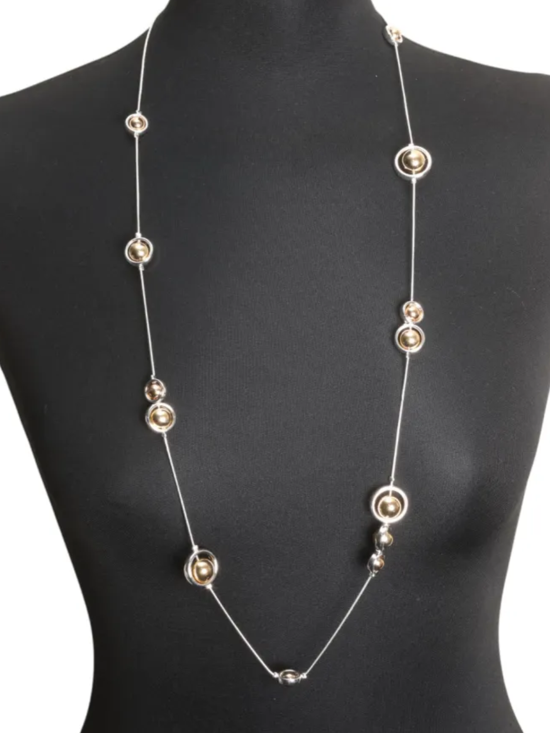 Jess & Lou NK409S long beaded circle statement necklace in silver with gold accents – women’s layered fashion necklace for versatile styling.