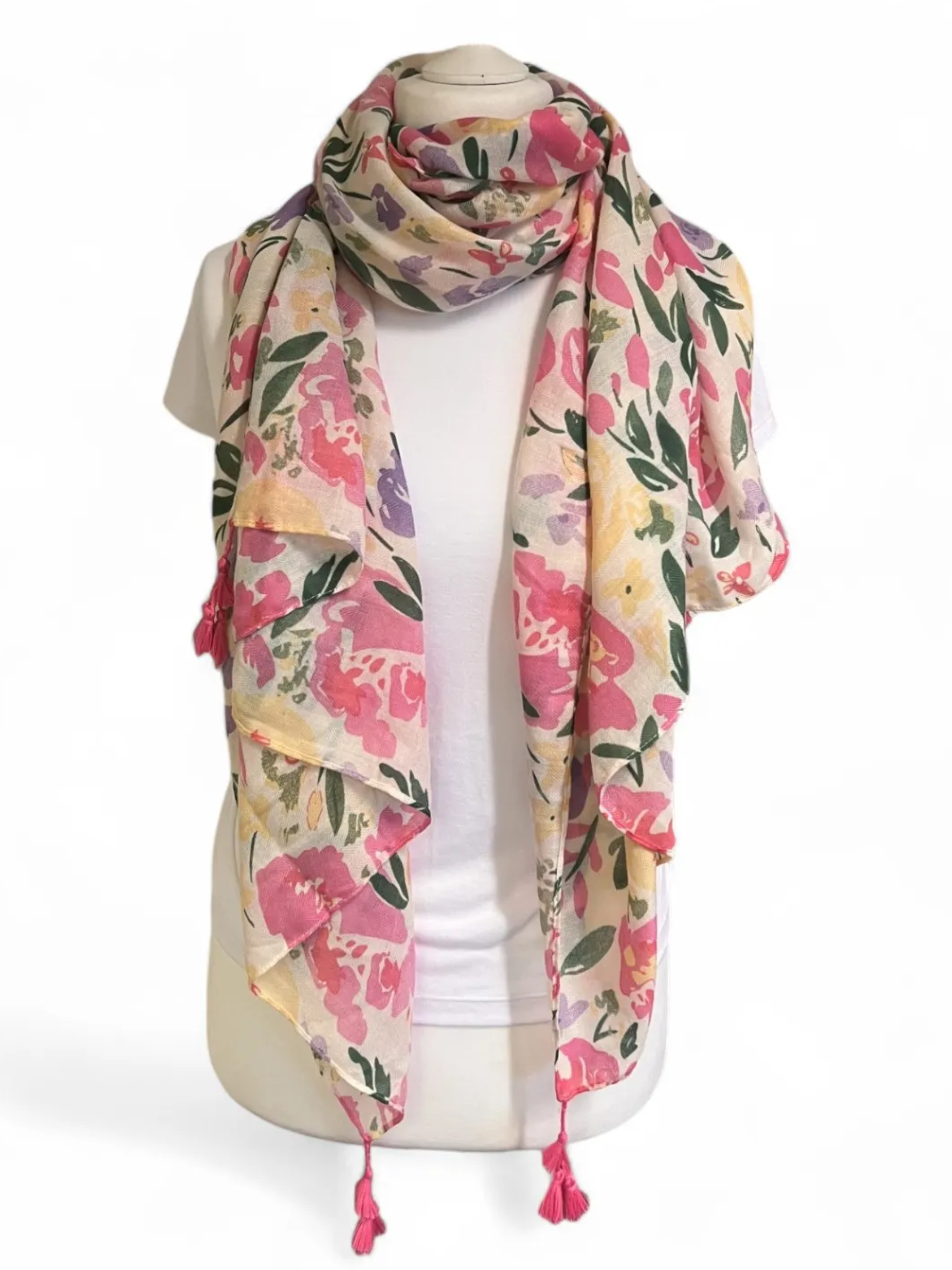 Jess & Lou SS421 women’s floral tassel scarf with soft pink and green print and tasselled corners.