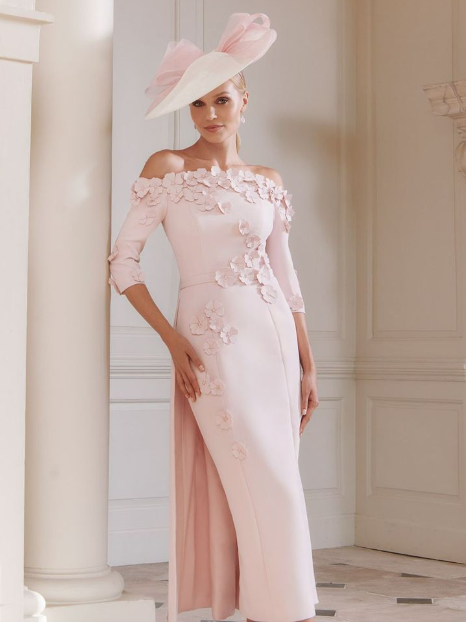 John Charles 29318 Petal Dress with off-shoulder neckline, ¾ sleeves, straight midi skirt, overskirt and 3D floral appliqué.