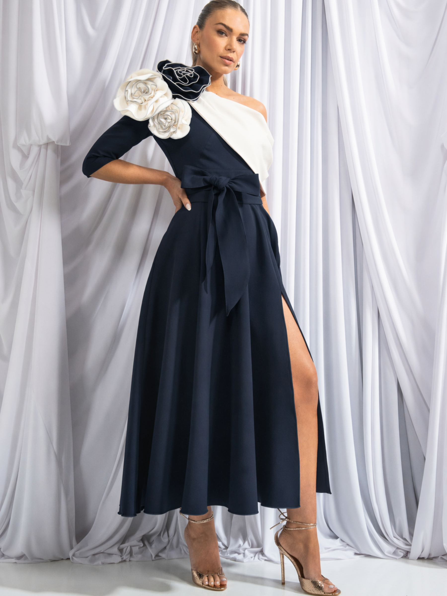 Kevan Jon Constantina Navy Ivory OS Flare Dress with one-shoulder neckline, detachable rosettes and self-tie belt