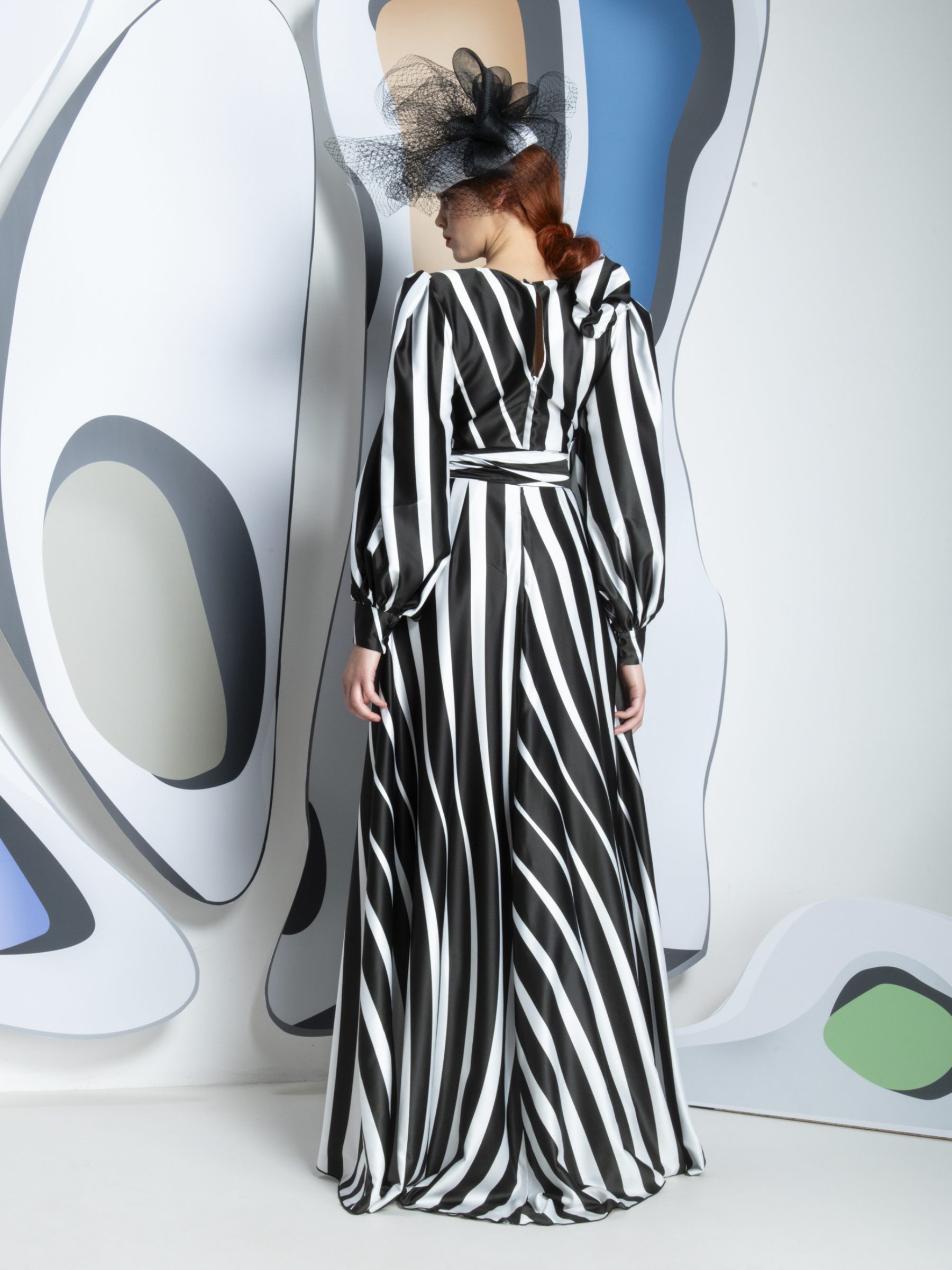 Kevan Jon Vivian Wrap Ball Reya Stripe Dress with wrap design, plunge neckline and shoulder corsage.