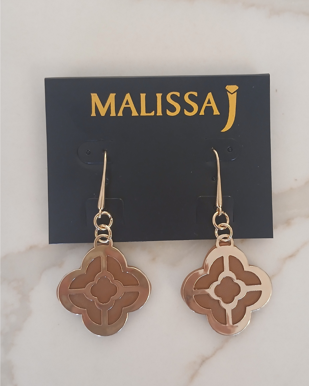 Gold and tan dangling earrings
