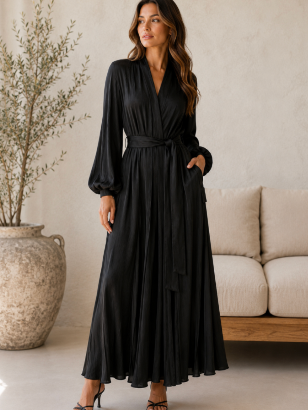 Malissa J WF2946 Long Sleeve Pleated Coat Jacket with an all-over pleated finish, shawl collar, self-tie waist belt, long sleeves and a flowing longline silhouette.