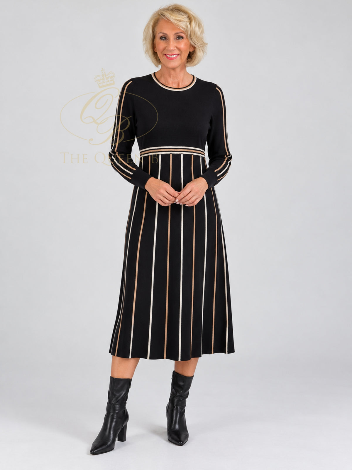 Micha 925 Dress with round neckline, long sleeves, defined waist and vertically striped A-line midi skirt.